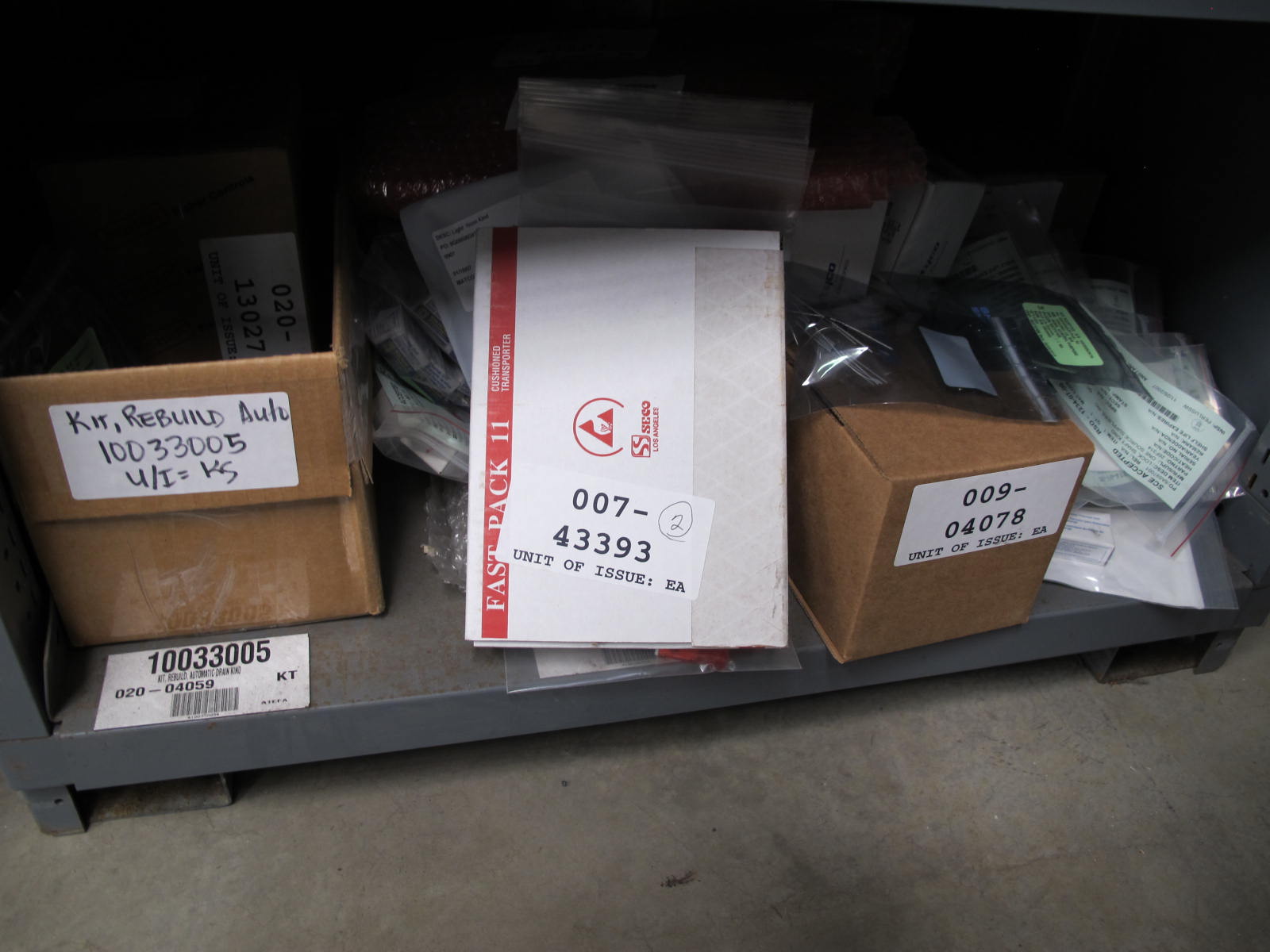STANLEY VIDMAR CABINET, 5 DRAWER, TO INCLUDE: BATTERIES, PRESSURE REGULATORS, FUSES, GLAND VALVES, CONNECTORS, COMPRESSOR VALVES, . LOCATED AT W-44. LOADING AND HANDLING FEE $25-364