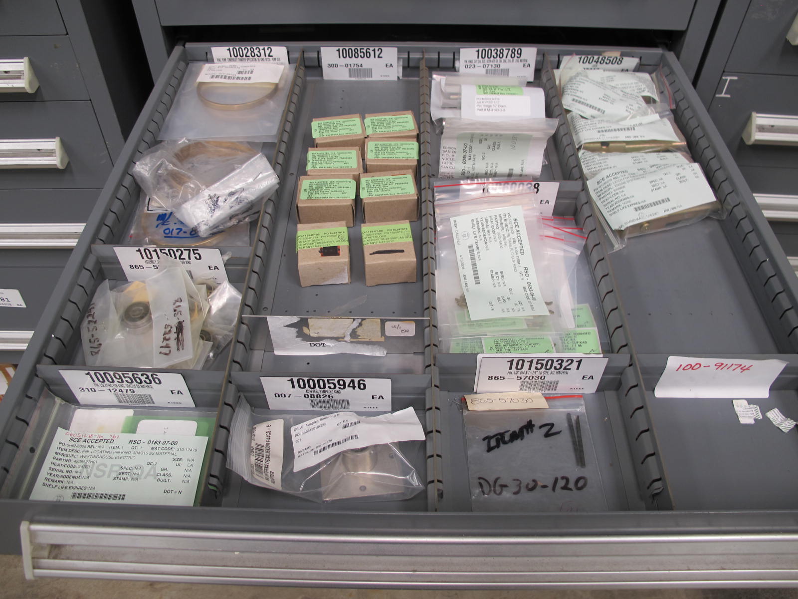 STANLEY VIDMAR CABINET, 5 DRAWER, TO INCLUDE: RELAYS, CONTACT BLOCKS, AIR COMPRESSOR PARTS, RELIEF VALVE. LOCATED AT W-44. LOADING AND HANDLING FEE $25-365