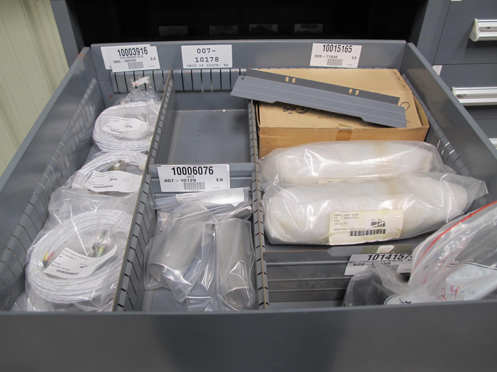 STANLEY VIDMAR CABINET, 5 DRAWER, TO INCLUDE: CAPACITORS, DETECTORS, CONTROL VALVES, TUBE CONNECTORS, COMPRESSOR VALVES, SEAT VALVES, RECTIFIERS, CONNECTOR, MOTOR CHART DRIVES. . LOCATED AT W-44. LOADING AND HANDLING FEE $25-368