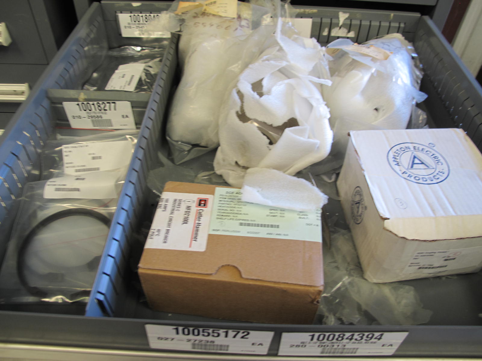 STANLEY VIDMAR CABINET, 11 DRAWER, TO INCLUDE: TUBE PLUGS, VALVES, SPRINGS, PINS, CIRCUIT BREAKERS, CAPACITORS. LOCATED AT W-44. LOADING AND HANDLING FEE $25-370