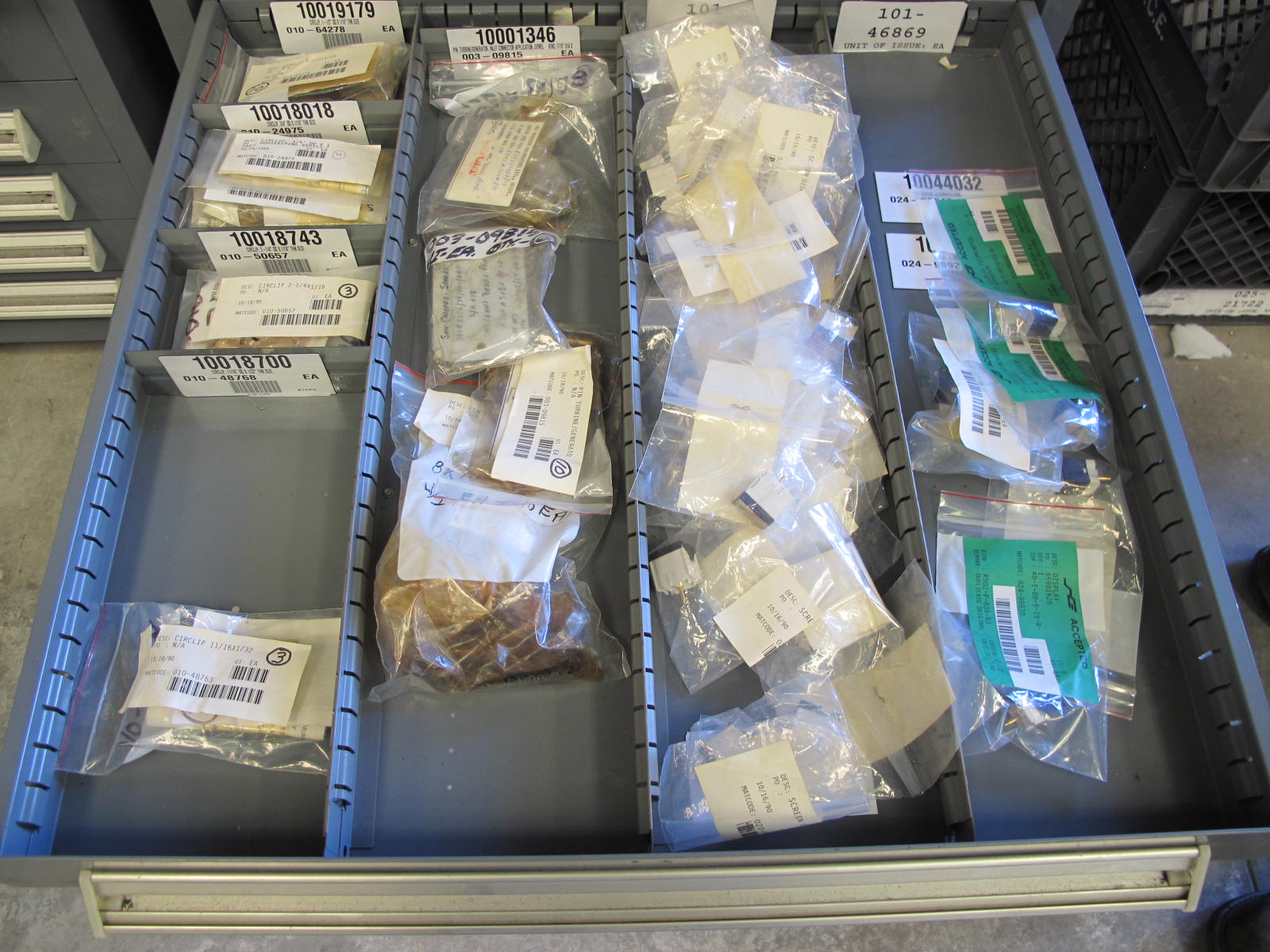 STANLEY VIDMAR CABINET, 11 DRAWER, TO INCLUDE: TUBE PLUGS, VALVES, SPRINGS, PINS, CIRCUIT BREAKERS, CAPACITORS. LOCATED AT W-44. LOADING AND HANDLING FEE $25-370