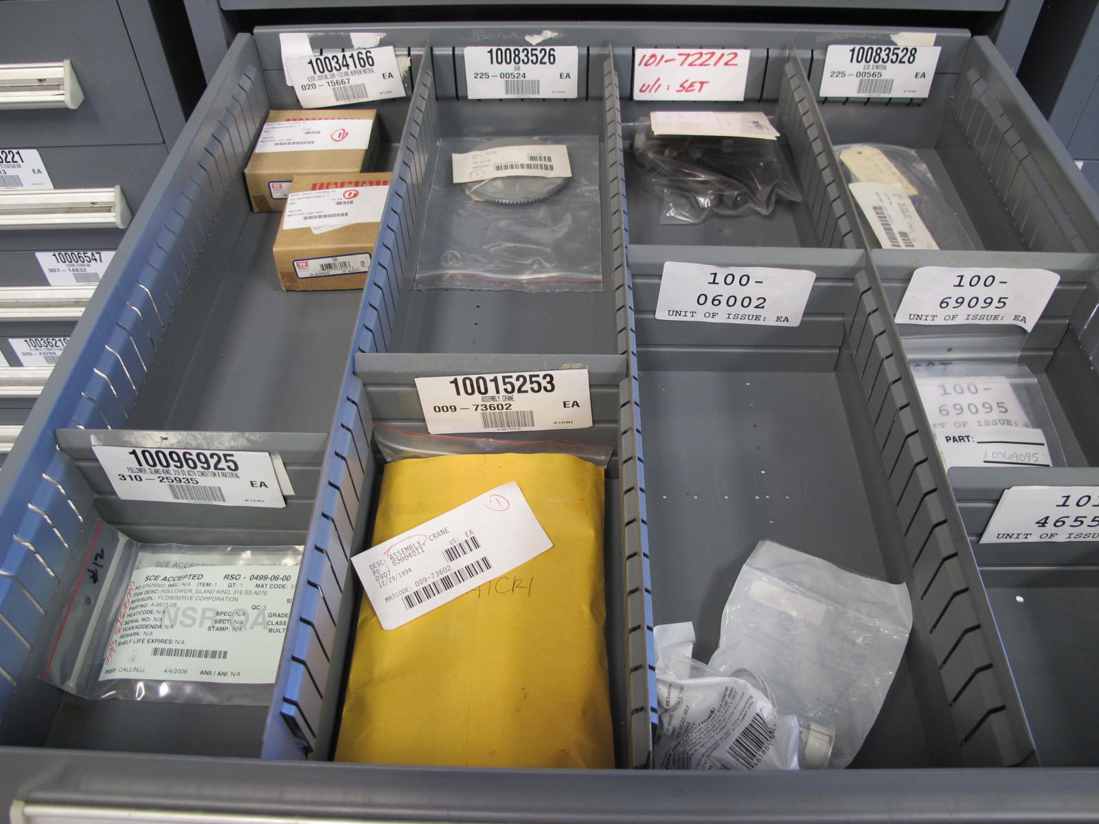 STANLEY VIDMAR CABINET, 11 DRAWER, TO INCLUDE: GASKETS, PRESSURE REGULATORS, INCANDESCENT LIGHTS, COUPLING SLEEVES, PRINTEDC CIRCUIT BOARDS, AIR FILTERS, BUSHINGS. LOCATED AT W-44. LOADING AND HANDLING FEE $25-371