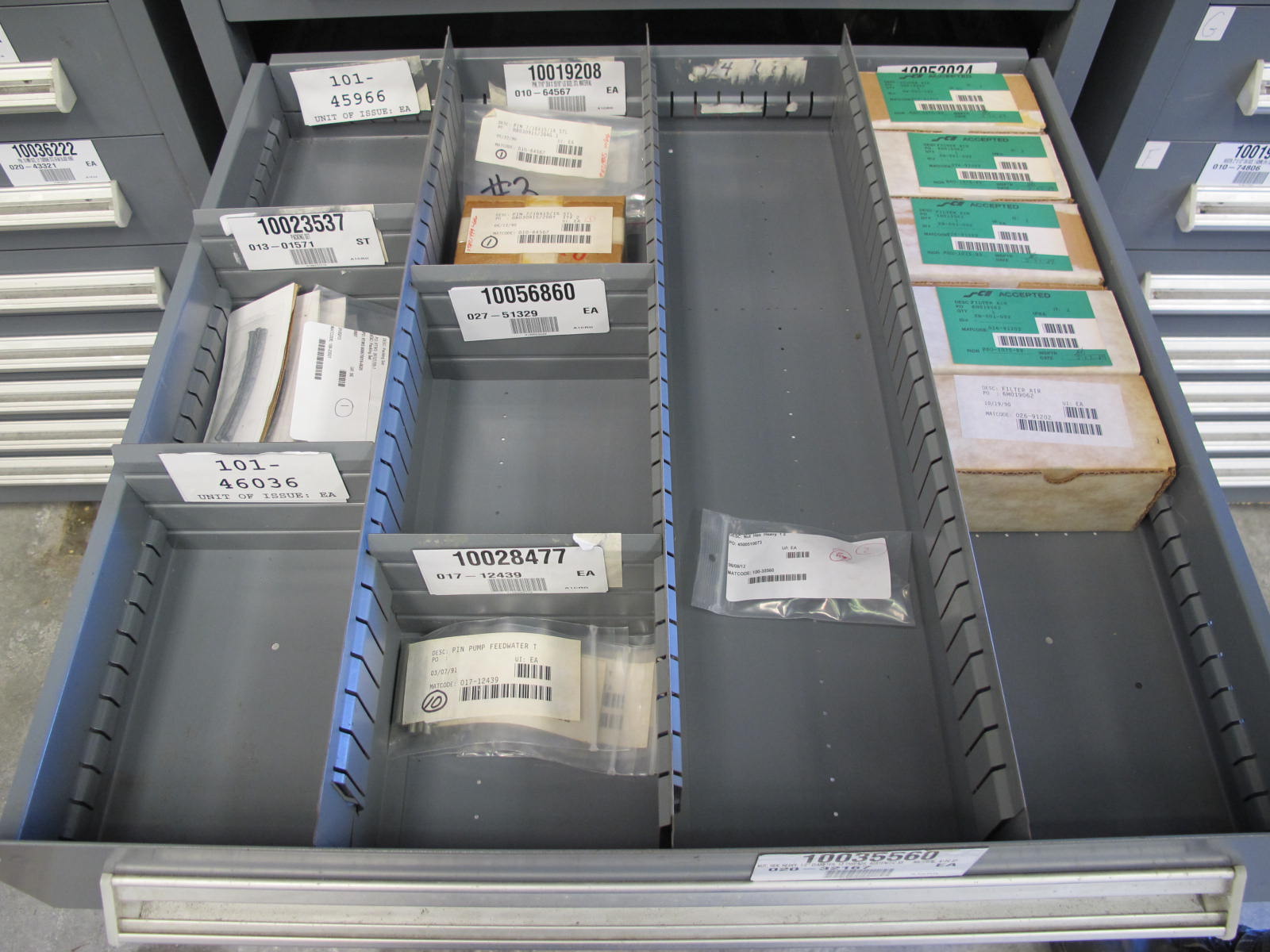 STANLEY VIDMAR CABINET, 11 DRAWER, TO INCLUDE: GASKETS, PRESSURE REGULATORS, INCANDESCENT LIGHTS, COUPLING SLEEVES, PRINTEDC CIRCUIT BOARDS, AIR FILTERS, BUSHINGS. LOCATED AT W-44. LOADING AND HANDLING FEE $25-371