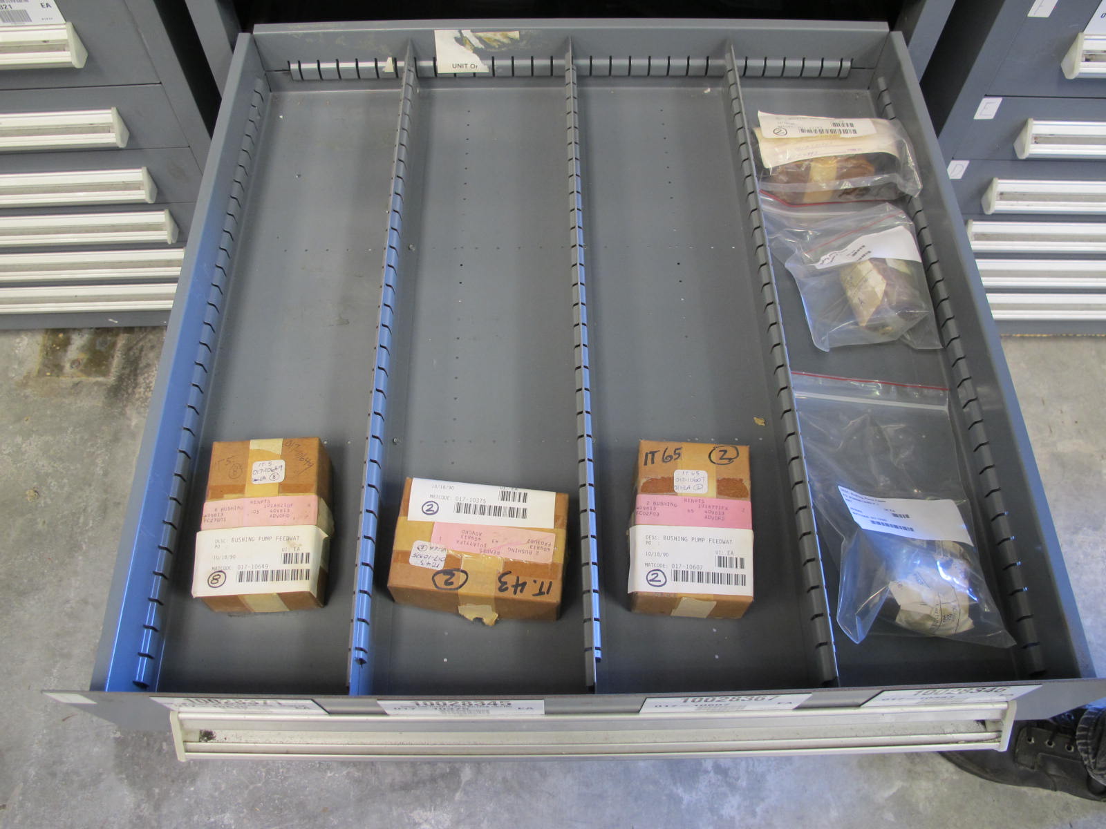 STANLEY VIDMAR CABINET, 11 DRAWER, TO INCLUDE: GASKETS, PRESSURE REGULATORS, INCANDESCENT LIGHTS, COUPLING SLEEVES, PRINTEDC CIRCUIT BOARDS, AIR FILTERS, BUSHINGS. LOCATED AT W-44. LOADING AND HANDLING FEE $25-371