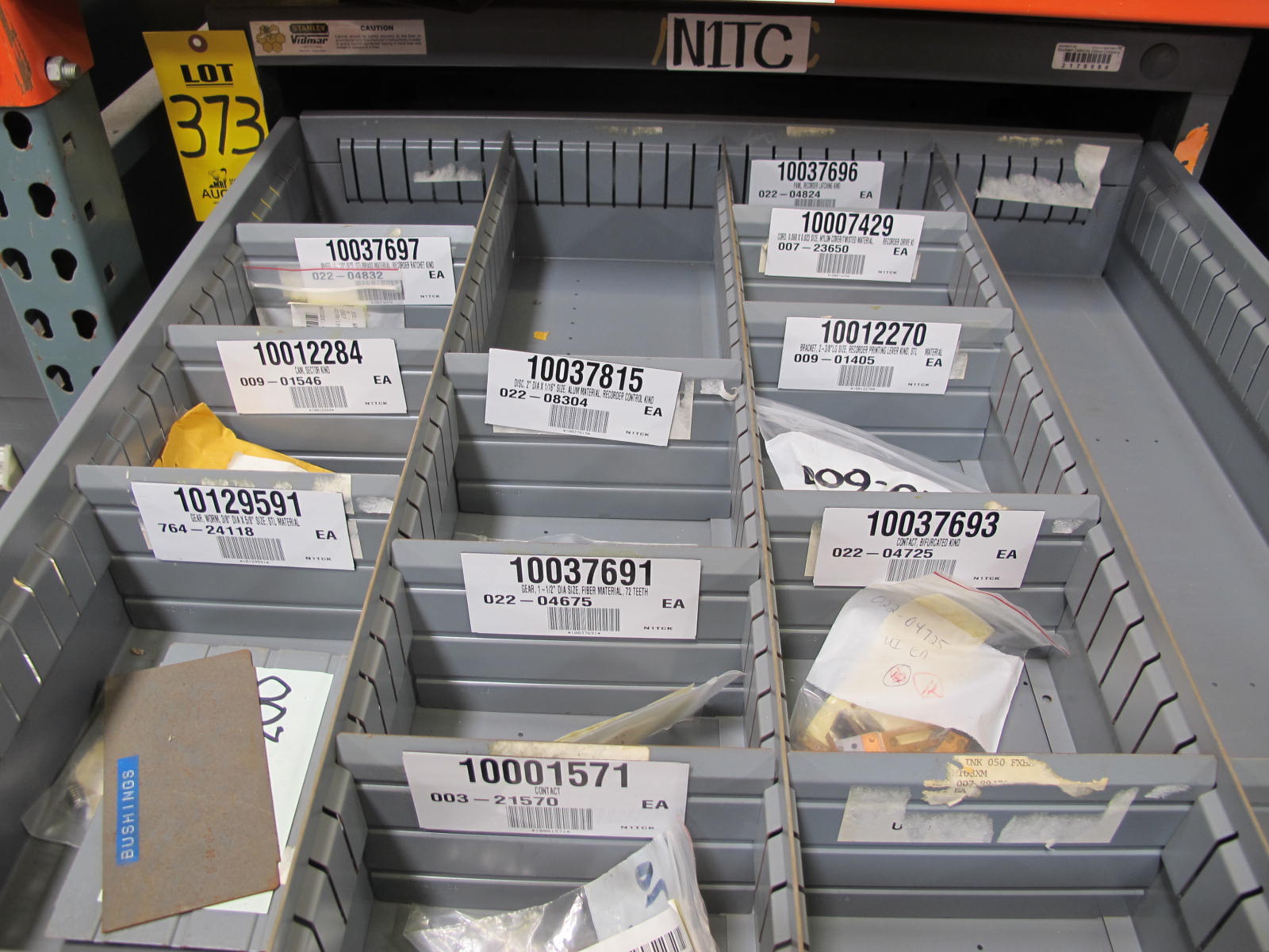 STANLEY VIDMAR CABINET, 11 DRAWER, TO INCLUDE: BIFURCATED CONTACTS, HINGES, BRACKETS, CORDS, MISC MODULES, THERMOWELLS, ELECTRICAL CONNECTORS, PROTECTORS, ELECTRIC VOLT METERS, PROBES. LOCATED AT W-50 . LOADING AND HANDLING FEE $25-373