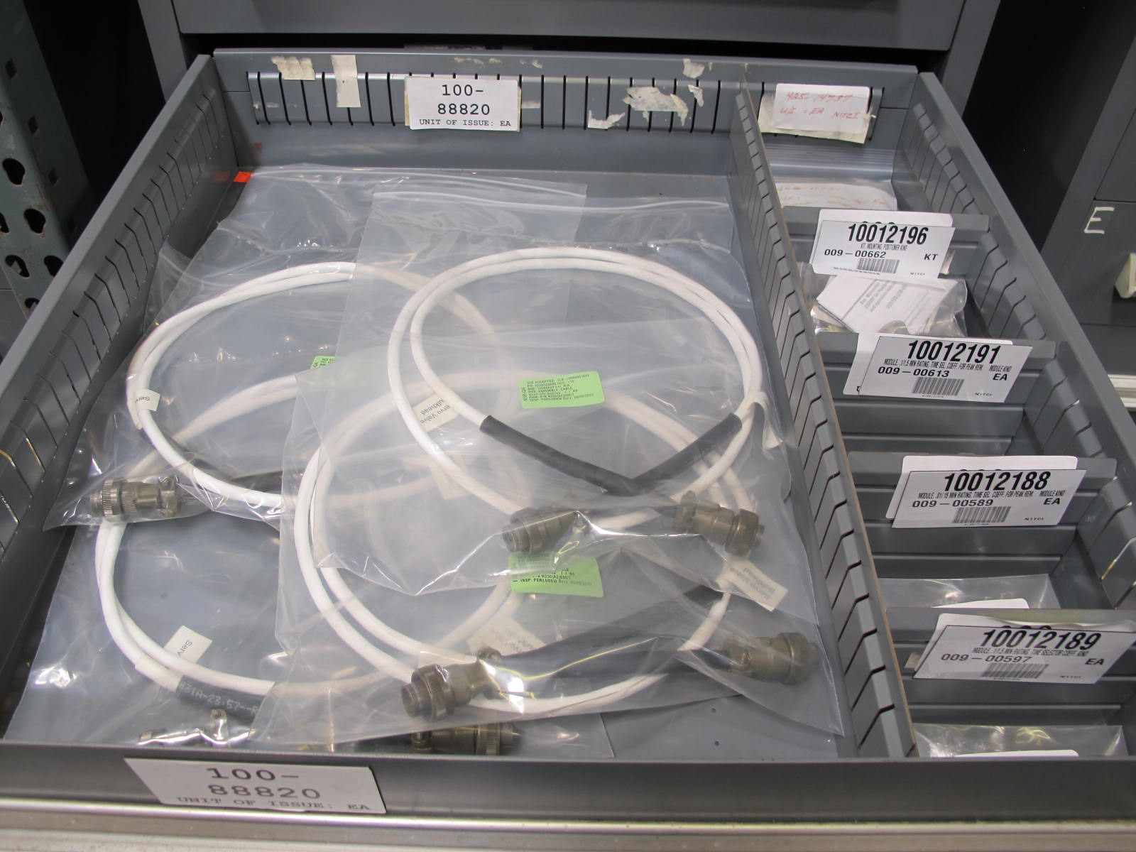 STANLEY VIDMAR CABINET, 11 DRAWER, TO INCLUDE: BIFURCATED CONTACTS, HINGES, BRACKETS, CORDS, MISC MODULES, THERMOWELLS, ELECTRICAL CONNECTORS, PROTECTORS, ELECTRIC VOLT METERS, PROBES. LOCATED AT W-50 . LOADING AND HANDLING FEE $25-373