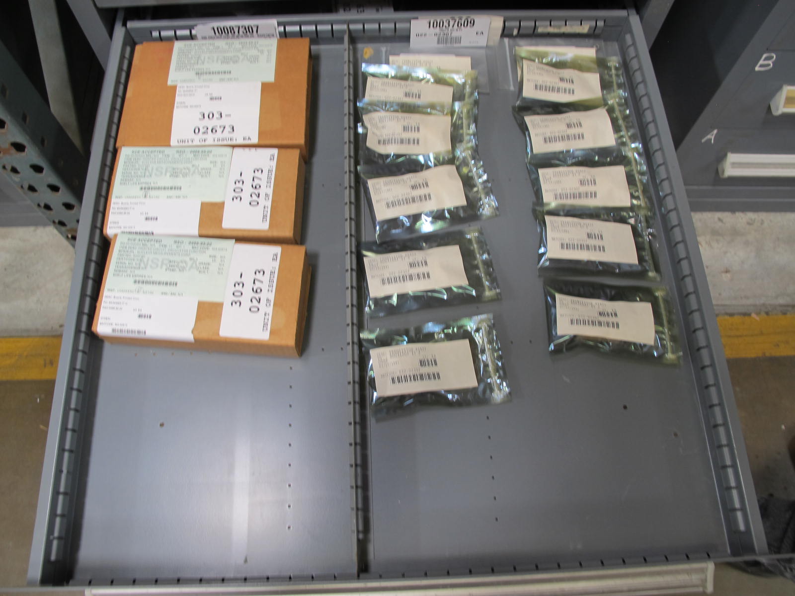 STANLEY VIDMAR CABINET, 11 DRAWER, TO INCLUDE: BIFURCATED CONTACTS, HINGES, BRACKETS, CORDS, MISC MODULES, THERMOWELLS, ELECTRICAL CONNECTORS, PROTECTORS, ELECTRIC VOLT METERS, PROBES. LOCATED AT W-50 . LOADING AND HANDLING FEE $25-373