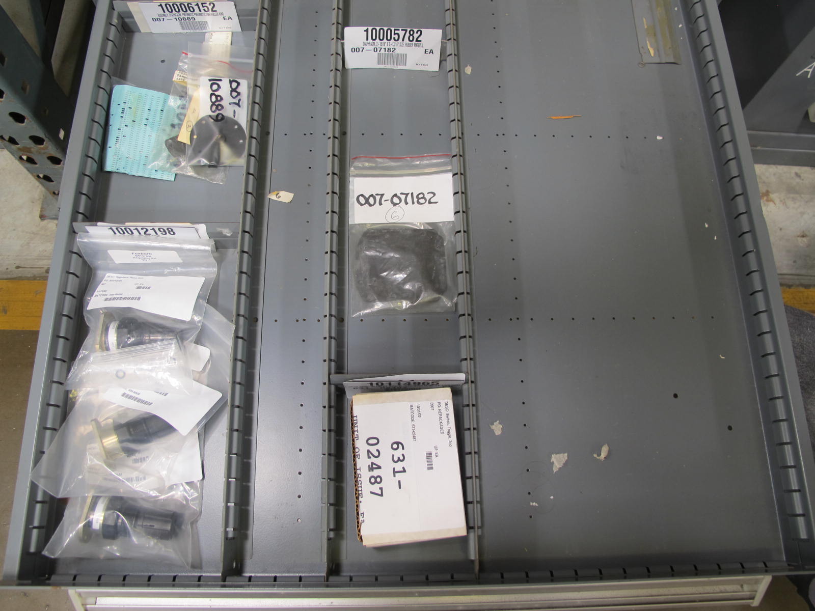 STANLEY VIDMAR CABINET, 11 DRAWER, TO INCLUDE: BIFURCATED CONTACTS, HINGES, BRACKETS, CORDS, MISC MODULES, THERMOWELLS, ELECTRICAL CONNECTORS, PROTECTORS, ELECTRIC VOLT METERS, PROBES. LOCATED AT W-50 . LOADING AND HANDLING FEE $25-373
