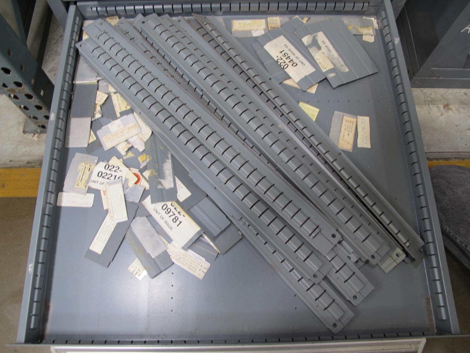 STANLEY VIDMAR CABINET, 11 DRAWER, TO INCLUDE: BIFURCATED CONTACTS, HINGES, BRACKETS, CORDS, MISC MODULES, THERMOWELLS, ELECTRICAL CONNECTORS, PROTECTORS, ELECTRIC VOLT METERS, PROBES. LOCATED AT W-50 . LOADING AND HANDLING FEE $25-373