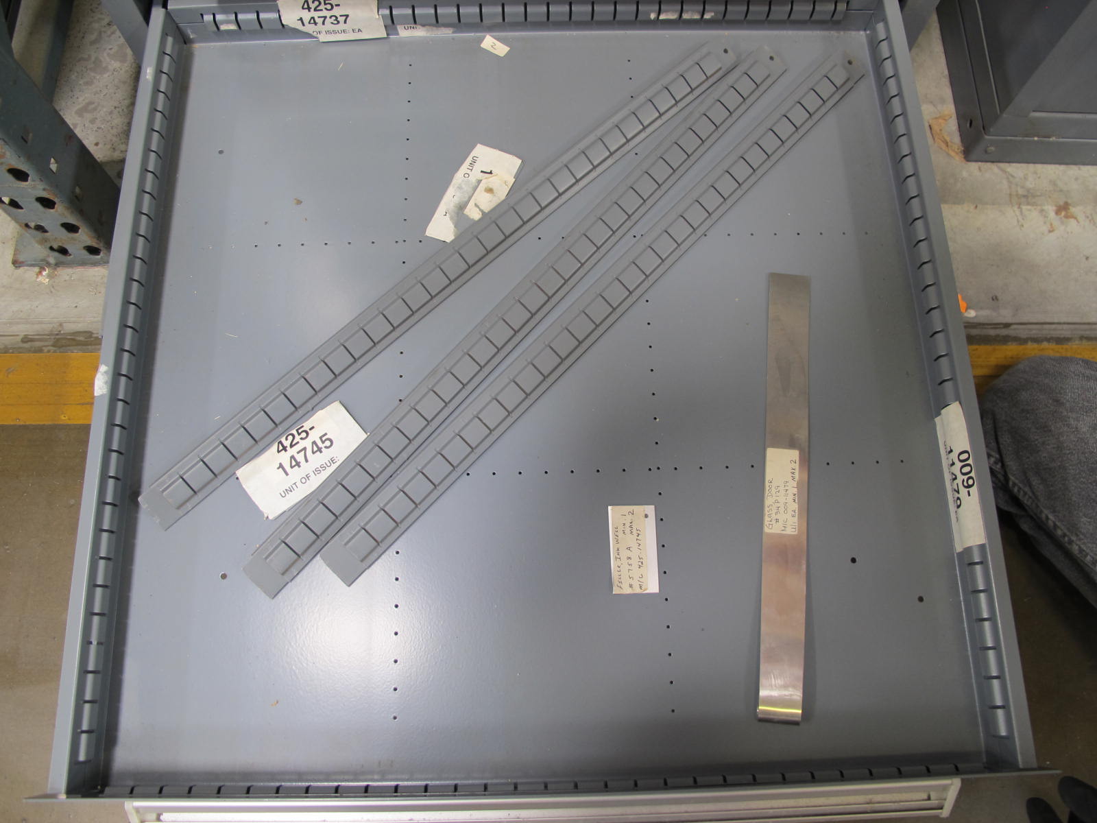 STANLEY VIDMAR CABINET, 11 DRAWER, TO INCLUDE: BIFURCATED CONTACTS, HINGES, BRACKETS, CORDS, MISC MODULES, THERMOWELLS, ELECTRICAL CONNECTORS, PROTECTORS, ELECTRIC VOLT METERS, PROBES. LOCATED AT W-50 . LOADING AND HANDLING FEE $25-373