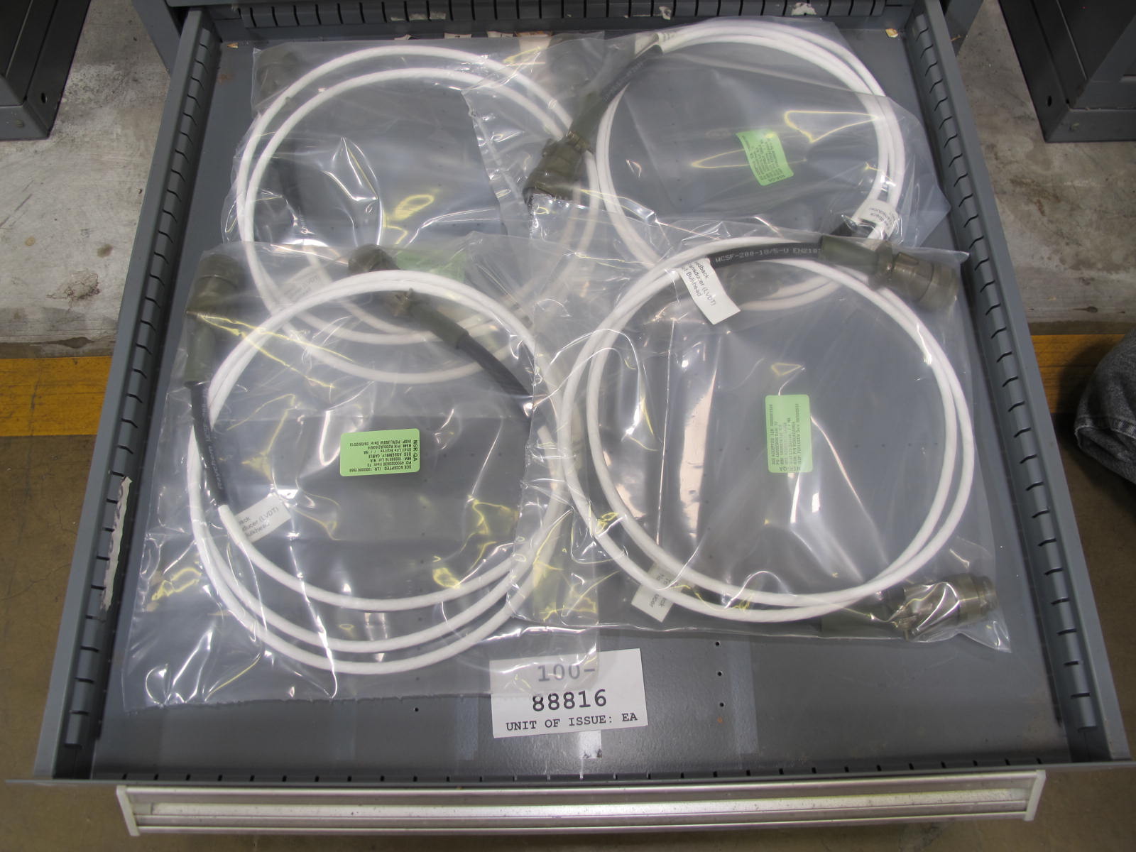 STANLEY VIDMAR CABINET, 11 DRAWER, TO INCLUDE: AMP METER, THERMOSTAT, TRANSMITTER ASSEMBLY, CONNECTOR SLEEVES, SPECTROME AMPLIFIER, PILOT RELAY, FUSES, FLOAT MONELS, CORDS. LOCATED AT W-50 . LOADING AND HANDLING FEE $25-374