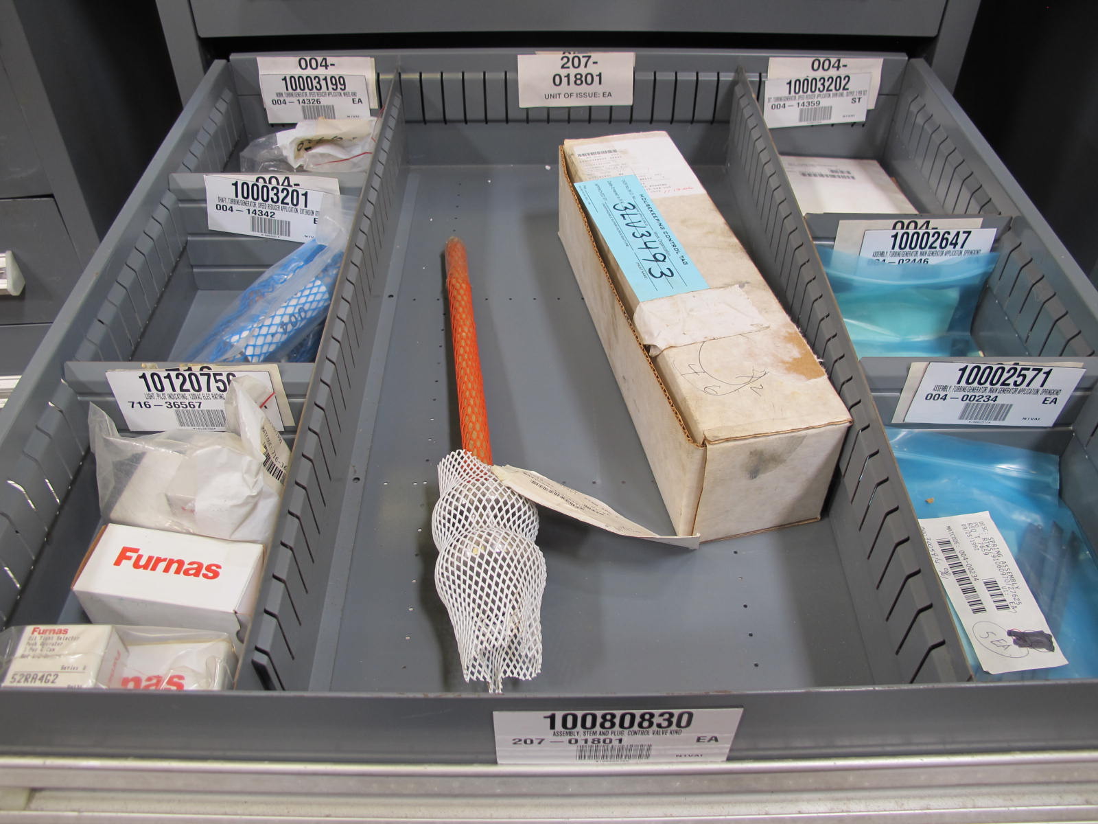 STANLEY VIDMAR CABINET, 11 DRAWER, TO INCLUDE: TERMINAL BLOCKS, PILOT LIGHTS, BELLOWS, SHAFTS, CAPS, PLUG VALVES, CIRCUITS . LOCATED AT W-50 . LOADING AND HANDLING FEE $25-375