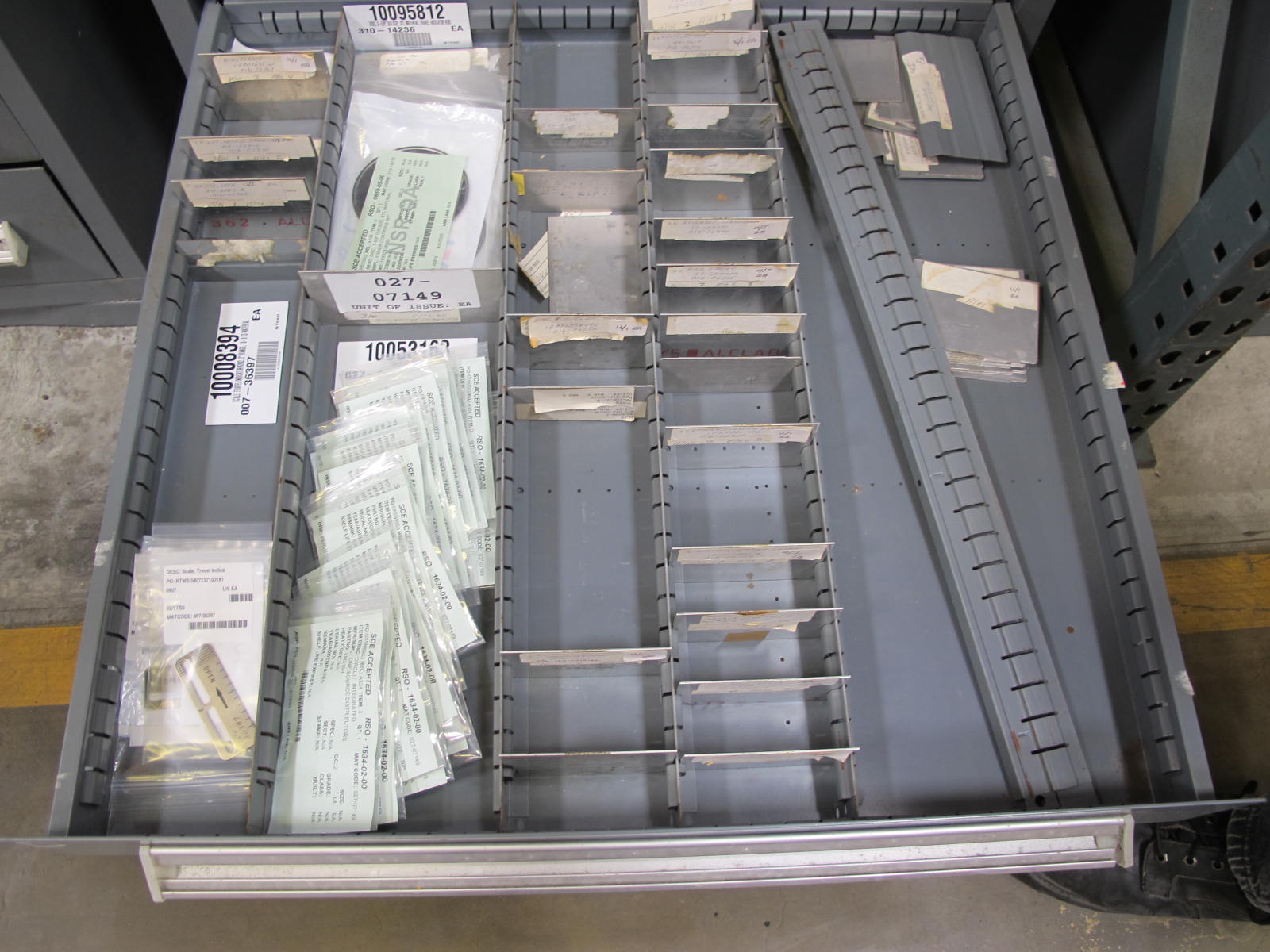 STANLEY VIDMAR CABINET, 11 DRAWER, TO INCLUDE: TERMINAL BLOCKS, PILOT LIGHTS, BELLOWS, SHAFTS, CAPS, PLUG VALVES, CIRCUITS . LOCATED AT W-50 . LOADING AND HANDLING FEE $25-375