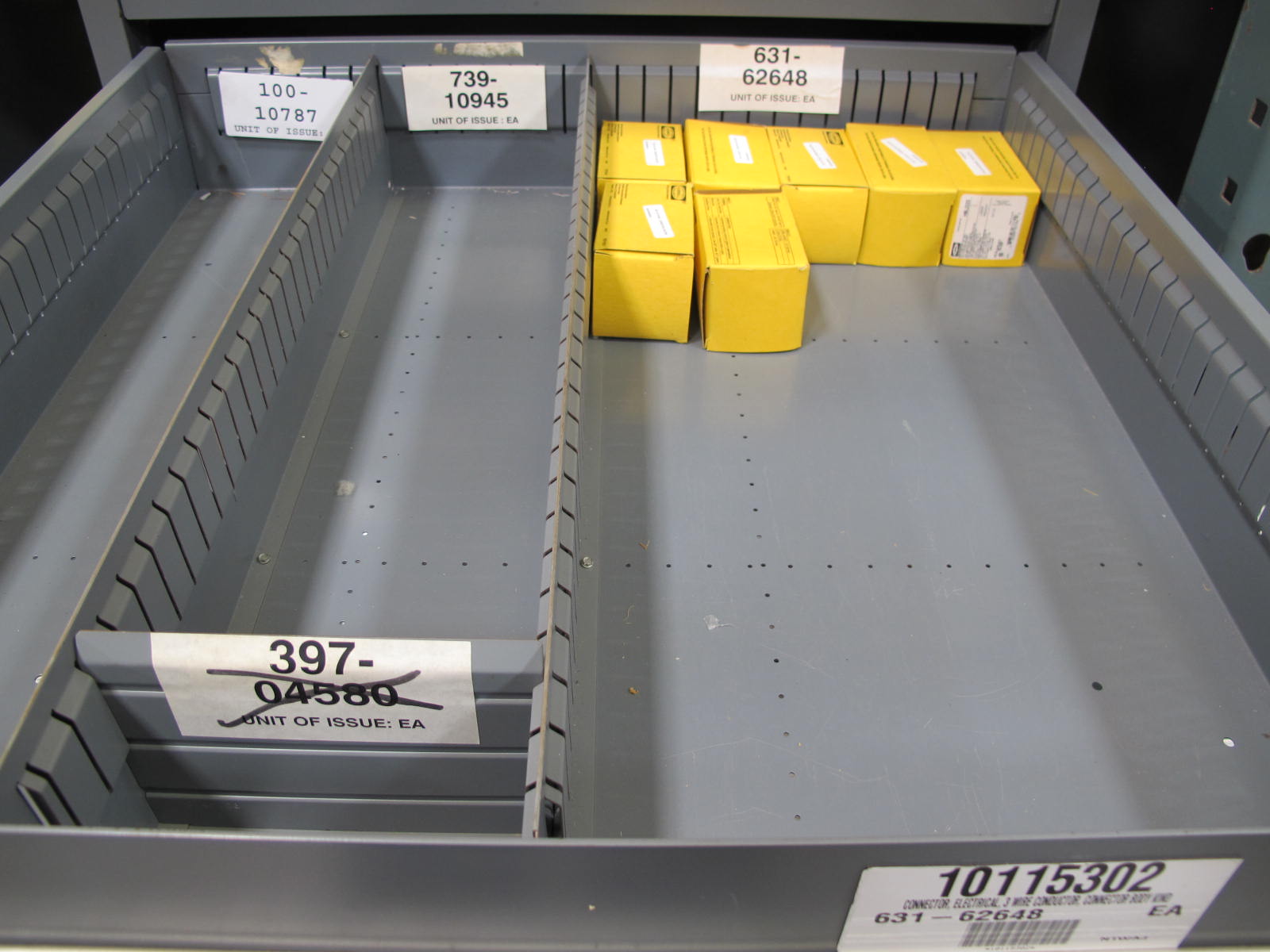 STANLEY VIDMAR CABINET, 11 DRAWER, TO INCLUDE: POWER MONITORS, ELECTRICAL CONNECTORS, CONDUCTORS, COMPRESSOR CIRCUITS, TERMINAL BLOCKS, HEX NUTS, LED LIGHTS, MODULES, VOLT METERS. LOCATED AT W-50 . LOADING AND HANDLING FEE $25-376