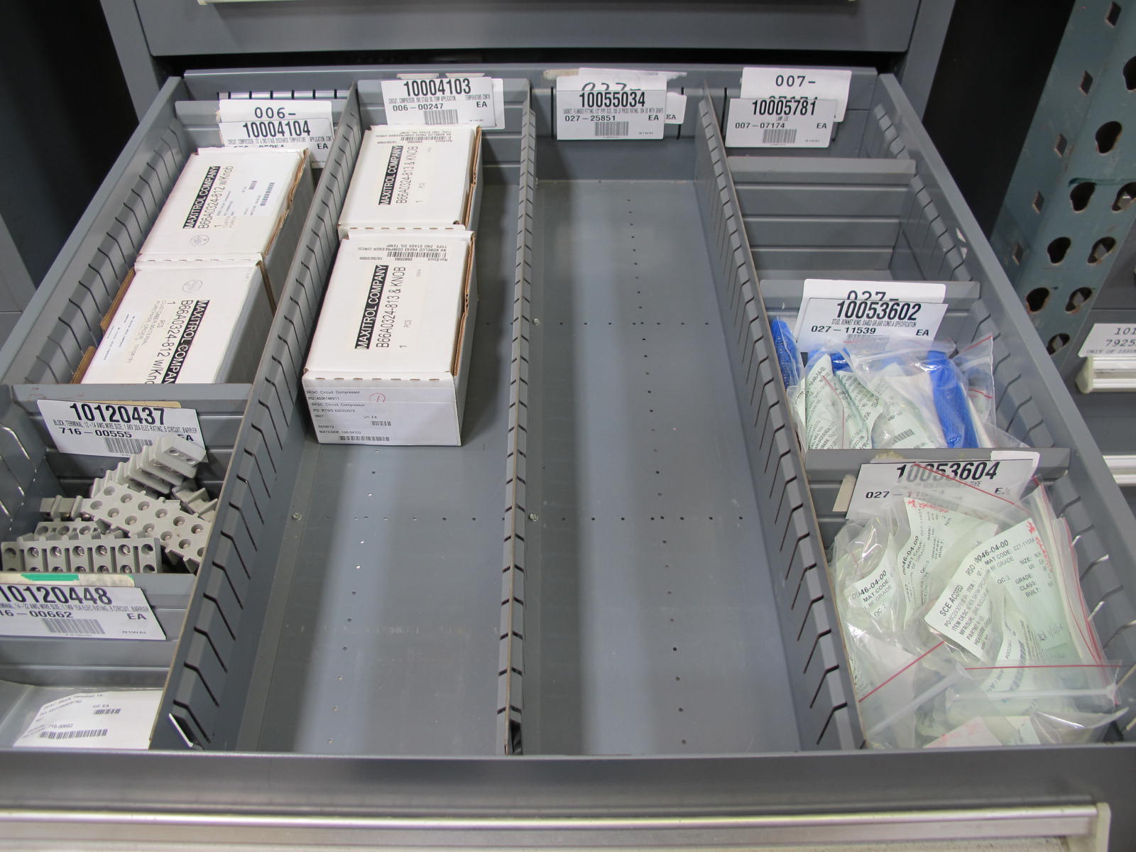 STANLEY VIDMAR CABINET, 11 DRAWER, TO INCLUDE: POWER MONITORS, ELECTRICAL CONNECTORS, CONDUCTORS, COMPRESSOR CIRCUITS, TERMINAL BLOCKS, HEX NUTS, LED LIGHTS, MODULES, VOLT METERS. LOCATED AT W-50 . LOADING AND HANDLING FEE $25-376