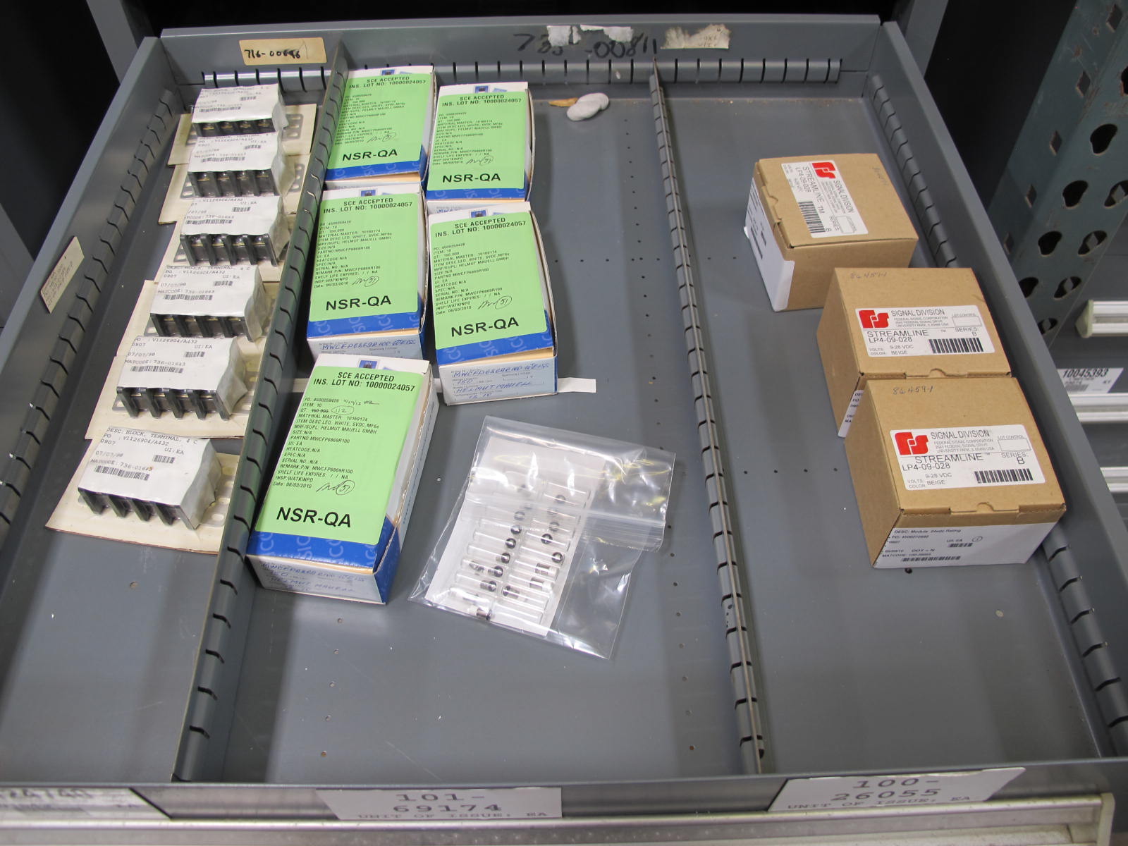 STANLEY VIDMAR CABINET, 11 DRAWER, TO INCLUDE: POWER MONITORS, ELECTRICAL CONNECTORS, CONDUCTORS, COMPRESSOR CIRCUITS, TERMINAL BLOCKS, HEX NUTS, LED LIGHTS, MODULES, VOLT METERS. LOCATED AT W-50 . LOADING AND HANDLING FEE $25-376
