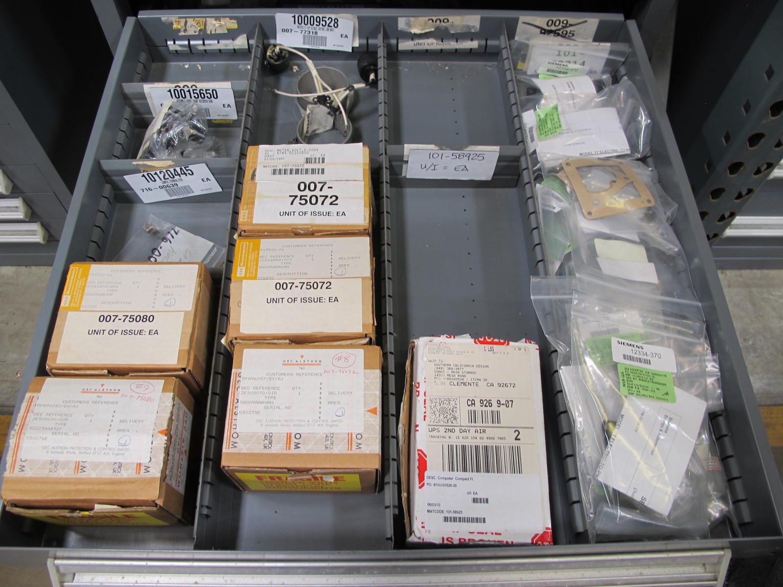 STANLEY VIDMAR CABINET, 11 DRAWER, TO INCLUDE: POWER MONITORS, ELECTRICAL CONNECTORS, CONDUCTORS, COMPRESSOR CIRCUITS, TERMINAL BLOCKS, HEX NUTS, LED LIGHTS, MODULES, VOLT METERS. LOCATED AT W-50 . LOADING AND HANDLING FEE $25-376