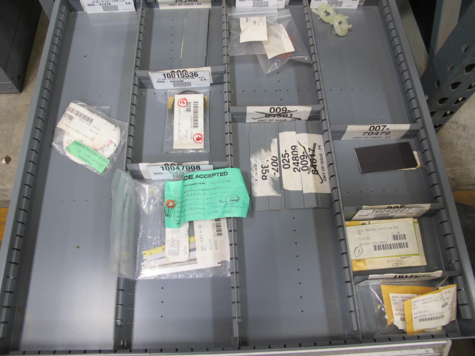 STANLEY VIDMAR CABINET, 11 DRAWER, TO INCLUDE: POWER MONITORS, ELECTRICAL CONNECTORS, CONDUCTORS, COMPRESSOR CIRCUITS, TERMINAL BLOCKS, HEX NUTS, LED LIGHTS, MODULES, VOLT METERS. LOCATED AT W-50 . LOADING AND HANDLING FEE $25-376