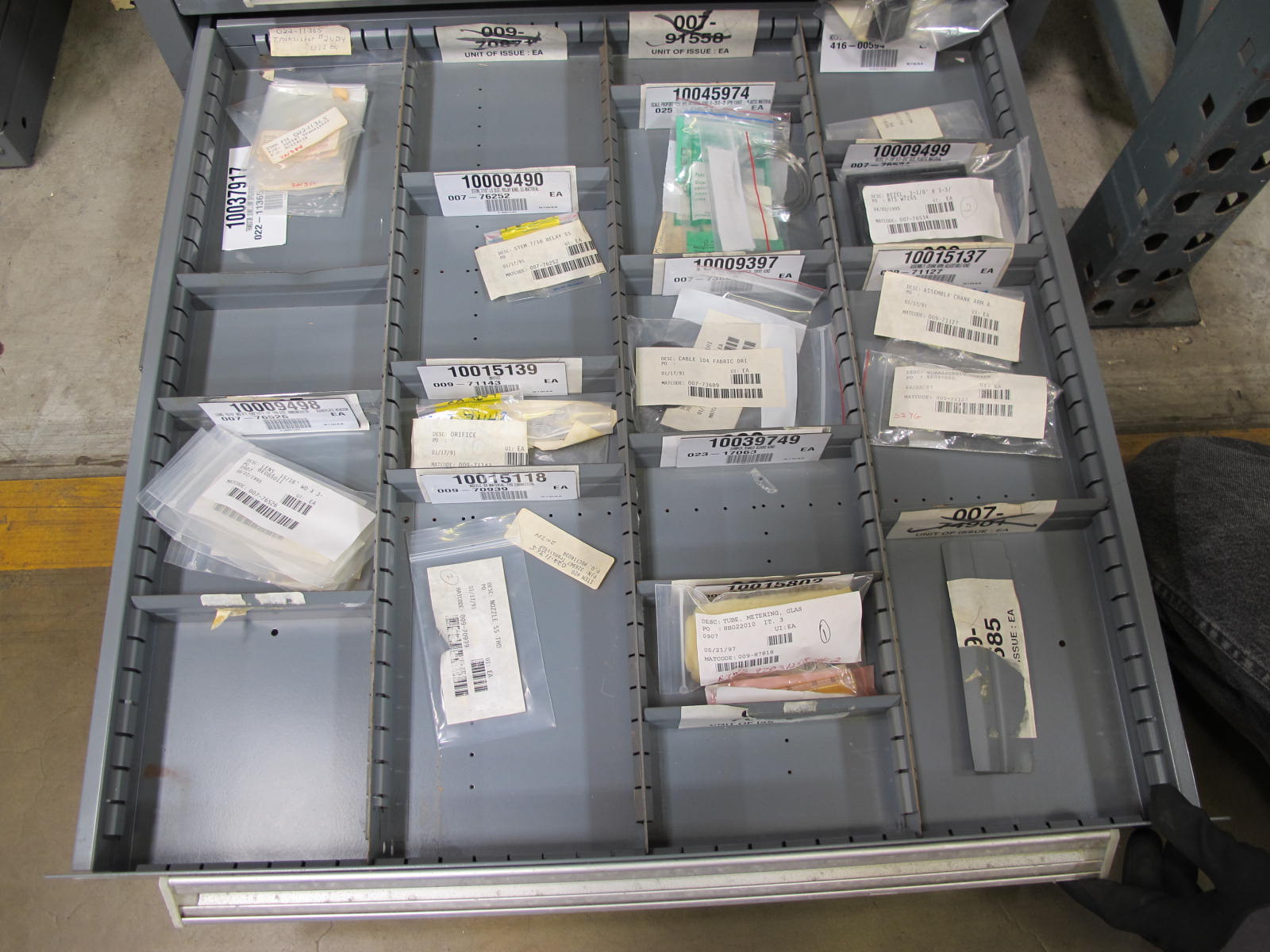 STANLEY VIDMAR CABINET, 11 DRAWER, TO INCLUDE: POWER MONITORS, ELECTRICAL CONNECTORS, CONDUCTORS, COMPRESSOR CIRCUITS, TERMINAL BLOCKS, HEX NUTS, LED LIGHTS, MODULES, VOLT METERS. LOCATED AT W-50 . LOADING AND HANDLING FEE $25-376