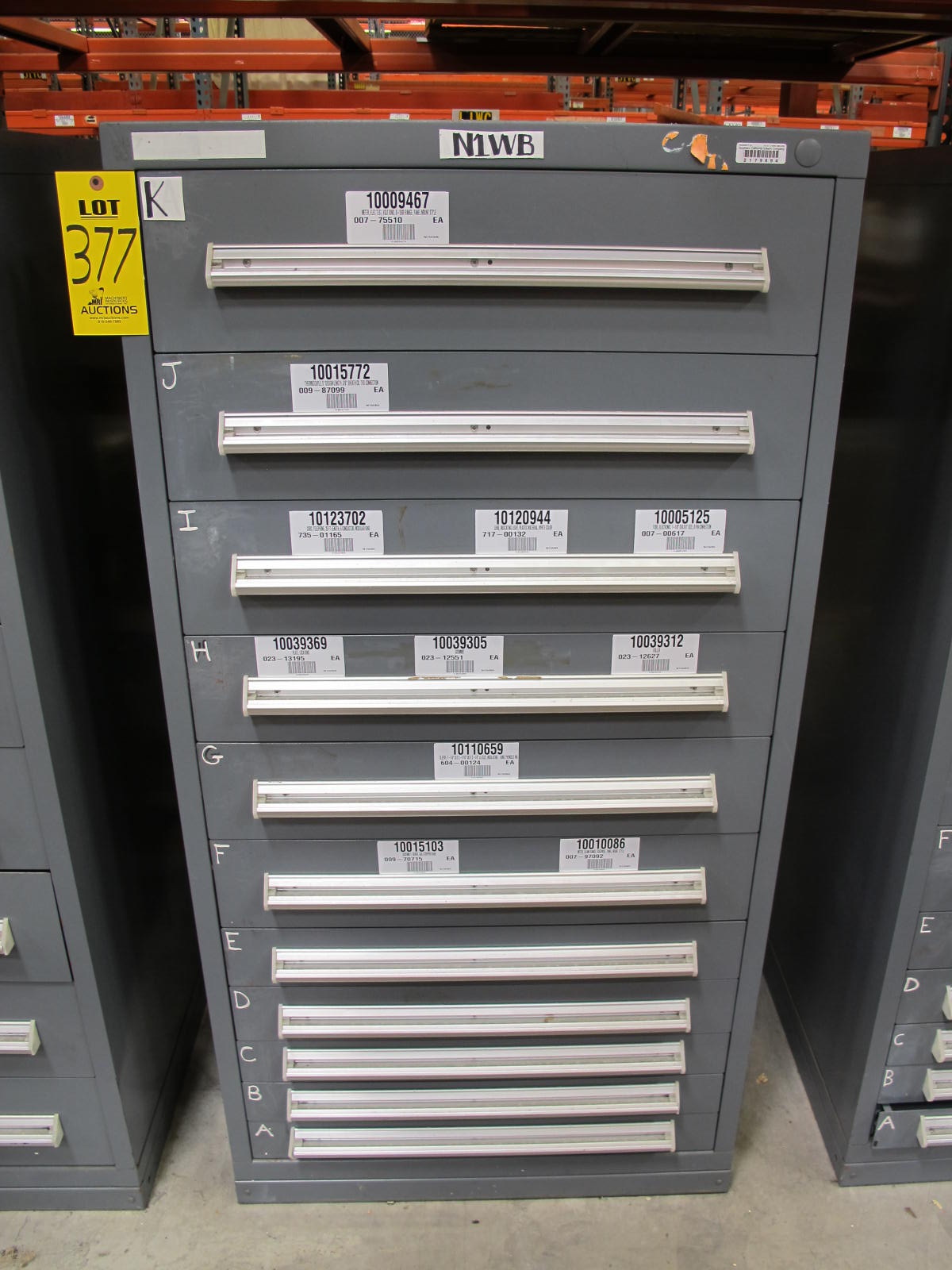 STANLEY VIDMAR CABINET, 11 DRAWER, TO INCLUDE: VOLT METERS, THERMOCOUPLE WIRE, BALLASTS, GROMMETS, ROLLERS, BLANK METERS, SUPPRESSORS. LOCATED AT W-50 . LOADING AND HANDLING FEE $25-377