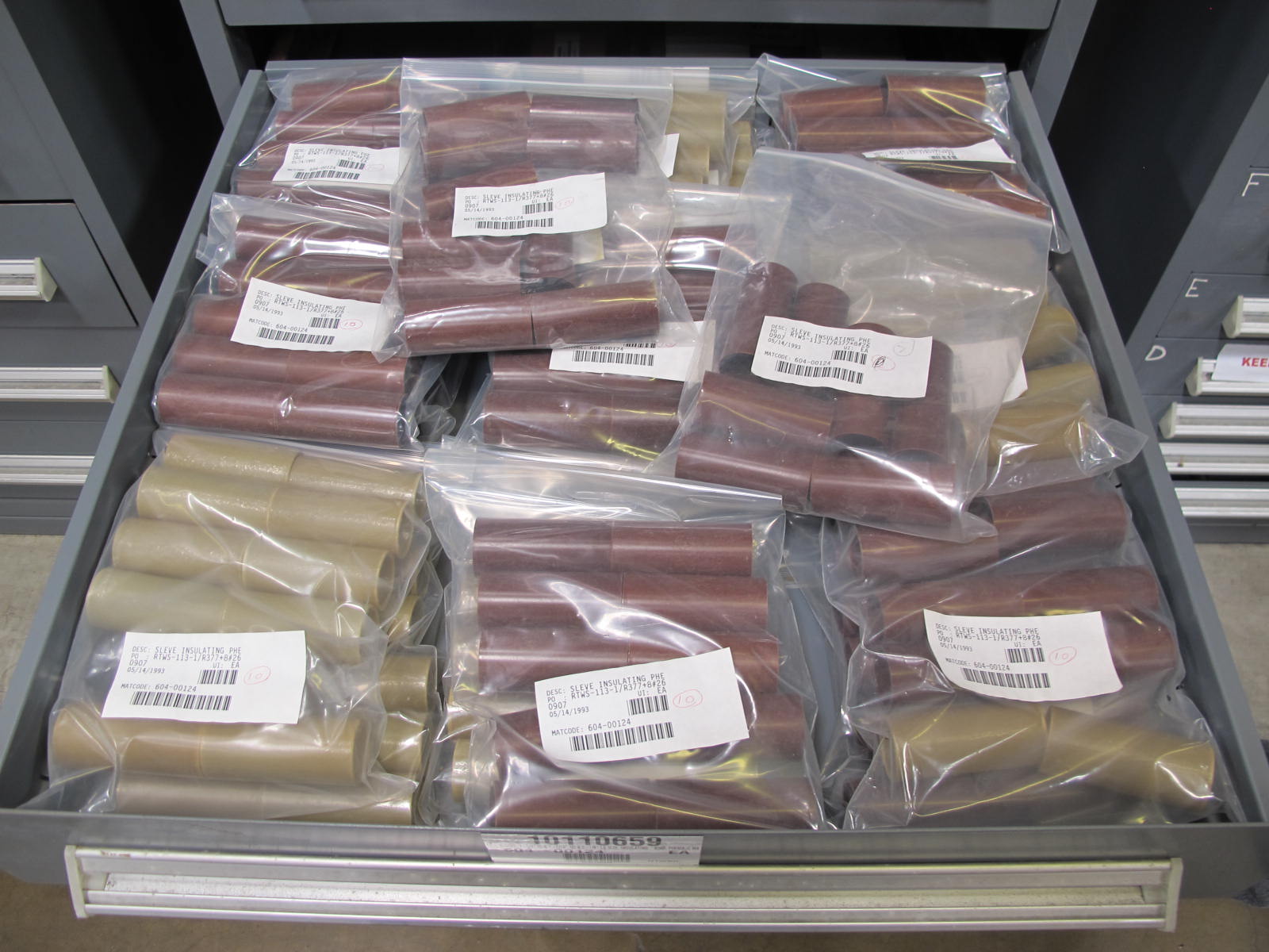 STANLEY VIDMAR CABINET, 11 DRAWER, TO INCLUDE: VOLT METERS, THERMOCOUPLE WIRE, BALLASTS, GROMMETS, ROLLERS, BLANK METERS, SUPPRESSORS. LOCATED AT W-50 . LOADING AND HANDLING FEE $25-377