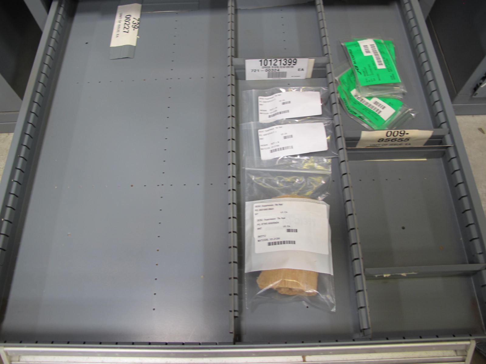 STANLEY VIDMAR CABINET, 11 DRAWER, TO INCLUDE: VOLT METERS, THERMOCOUPLE WIRE, BALLASTS, GROMMETS, ROLLERS, BLANK METERS, SUPPRESSORS. LOCATED AT W-50 . LOADING AND HANDLING FEE $25-377