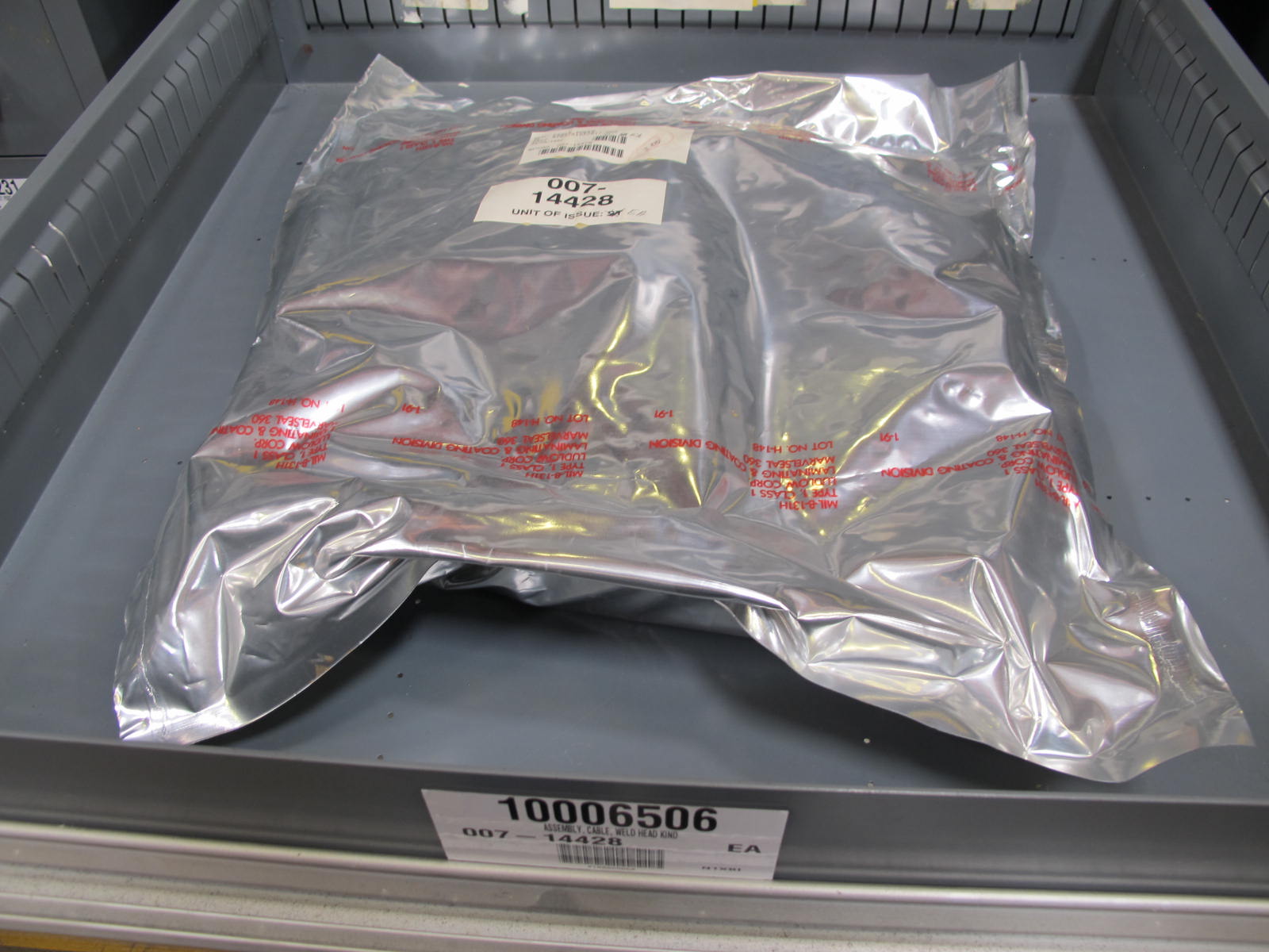 STANLEY VIDMAR CABINET, 11 DRAWER, TO INCLUDE: CARTIDGES, PROBES, FIRE ALARMS, CONNECTORS, TRANSDUCER. LOCATED AT W-50 . LOADING AND HANDLING FEE $25-378