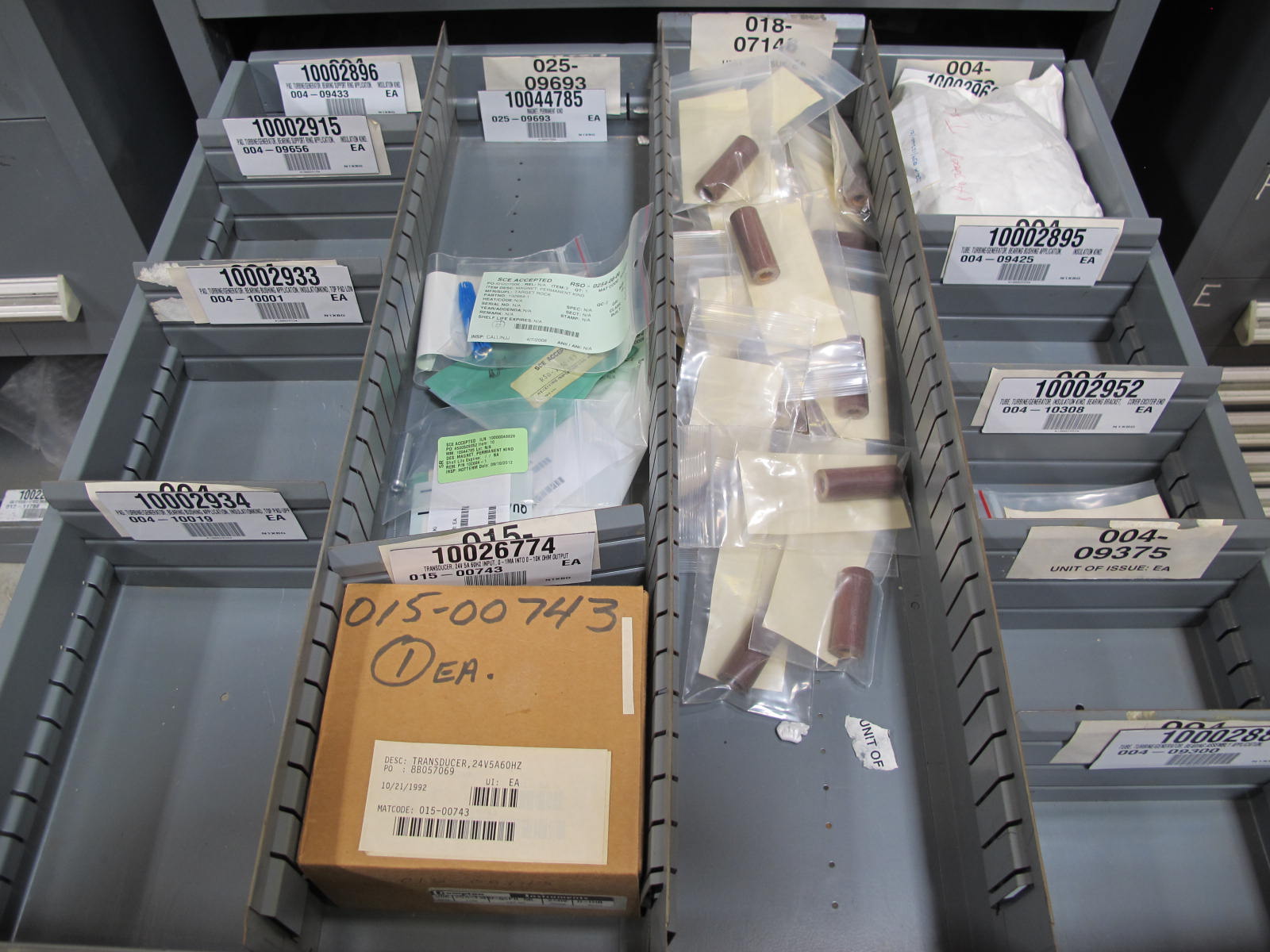 STANLEY VIDMAR CABINET, 11 DRAWER, TO INCLUDE: CARTIDGES, PROBES, FIRE ALARMS, CONNECTORS, TRANSDUCER. LOCATED AT W-50 . LOADING AND HANDLING FEE $25-378