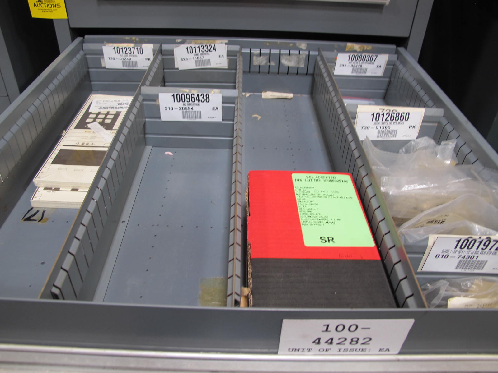 STANLEY VIDMAR CABINET, 11 DRAWER, TO INCLUDE: SPROCKETS, KNOBS, FLANGES, SYNCHROSCOPE, RESISTANCE DETECTORS, COMPRESSOR DETECTOR, SHEAVE, COVERS, POWER SUPPLIES, RESISTORS. LOCATED AT W-50 . LOADING AND HANDLING FEE $25-379