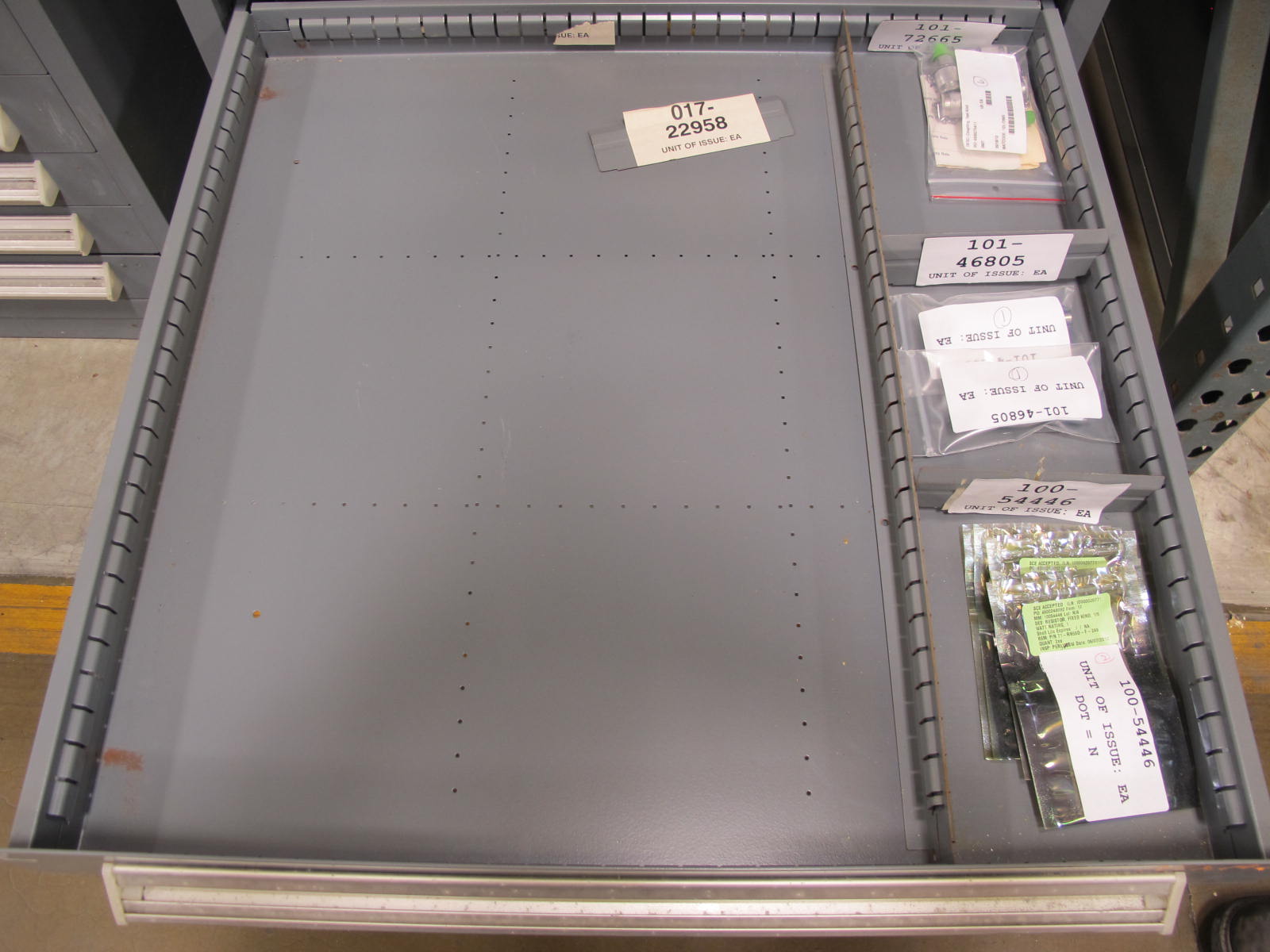 STANLEY VIDMAR CABINET, 11 DRAWER, TO INCLUDE: SPROCKETS, KNOBS, FLANGES, SYNCHROSCOPE, RESISTANCE DETECTORS, COMPRESSOR DETECTOR, SHEAVE, COVERS, POWER SUPPLIES, RESISTORS. LOCATED AT W-50 . LOADING AND HANDLING FEE $25-379