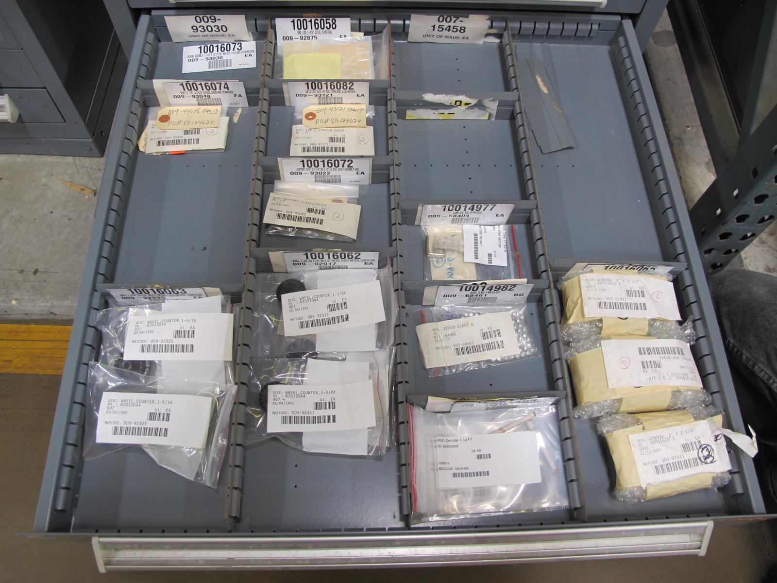 STANLEY VIDMAR CABINET, 11 DRAWER, TO INCLUDE: SPROCKETS, KNOBS, FLANGES, SYNCHROSCOPE, RESISTANCE DETECTORS, COMPRESSOR DETECTOR, SHEAVE, COVERS, POWER SUPPLIES, RESISTORS. LOCATED AT W-50 . LOADING AND HANDLING FEE $25-379
