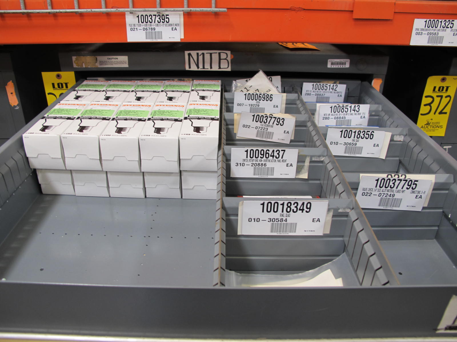 STANLEY VIDMAR CABINET, 8 DRAWER, TO INCLUDE: LIGHT BULBS, SWITCHES, PLUGS, RADIO ANTENNAS, CONTACT BLOCKS, CIRCUITS, SURGE PROTECTORS, SOCKETS, CORDS. LOCATED AT W-50 . LOADING AND HANDLING FEE $25-380