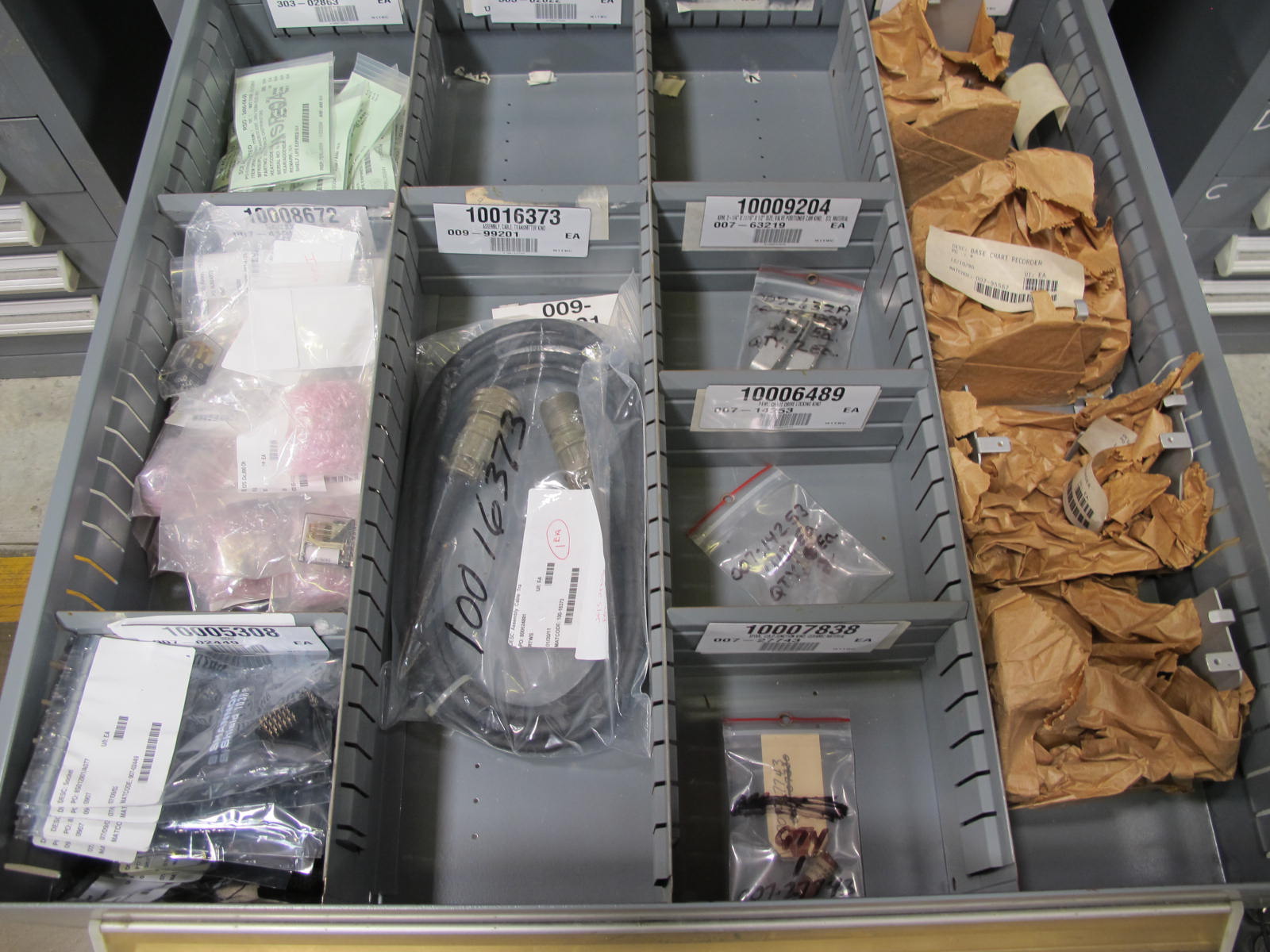 STANLEY VIDMAR CABINET, 8 DRAWER, TO INCLUDE: LIGHT BULBS, SWITCHES, PLUGS, RADIO ANTENNAS, CONTACT BLOCKS, CIRCUITS, SURGE PROTECTORS, SOCKETS, CORDS. LOCATED AT W-50 . LOADING AND HANDLING FEE $25-380