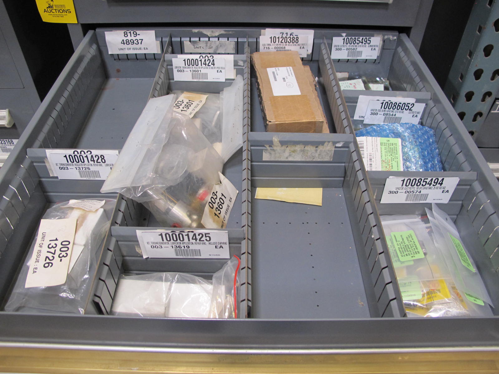 STANLEY VIDMAR CABINET, 8 DRAWER, TO INCLUDE: FLOW DETECTORS, TERMINAL BLOCKS, CAPACITORS, LUBRICATORS, CIRCUIT BREAKERS, VALVE MANIFOLDS, KEYBOARD DISPLAYS, PRESSURE REGULATOR. LOCATED AT W-50 . LOADING AND HANDLING FEE $25-381