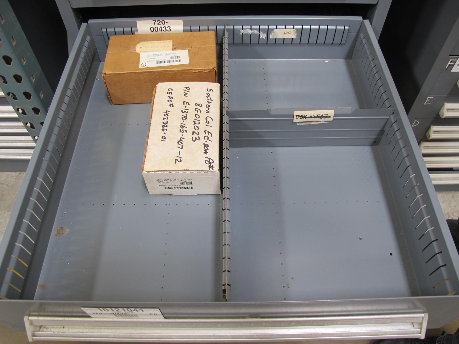 STANLEY VIDMAR CABINET, 8 DRAWER, TO INCLUDE: RIVETS, ELECTRICAL SOCKETS, CAPS, PHOTOELECTRIC CELLS, CAPACITORS, WORM AND SPUR GEARS, POWER SUPPLY, OILERS. LOCATED AT W-50 . LOADING AND HANDLING FEE $25-382