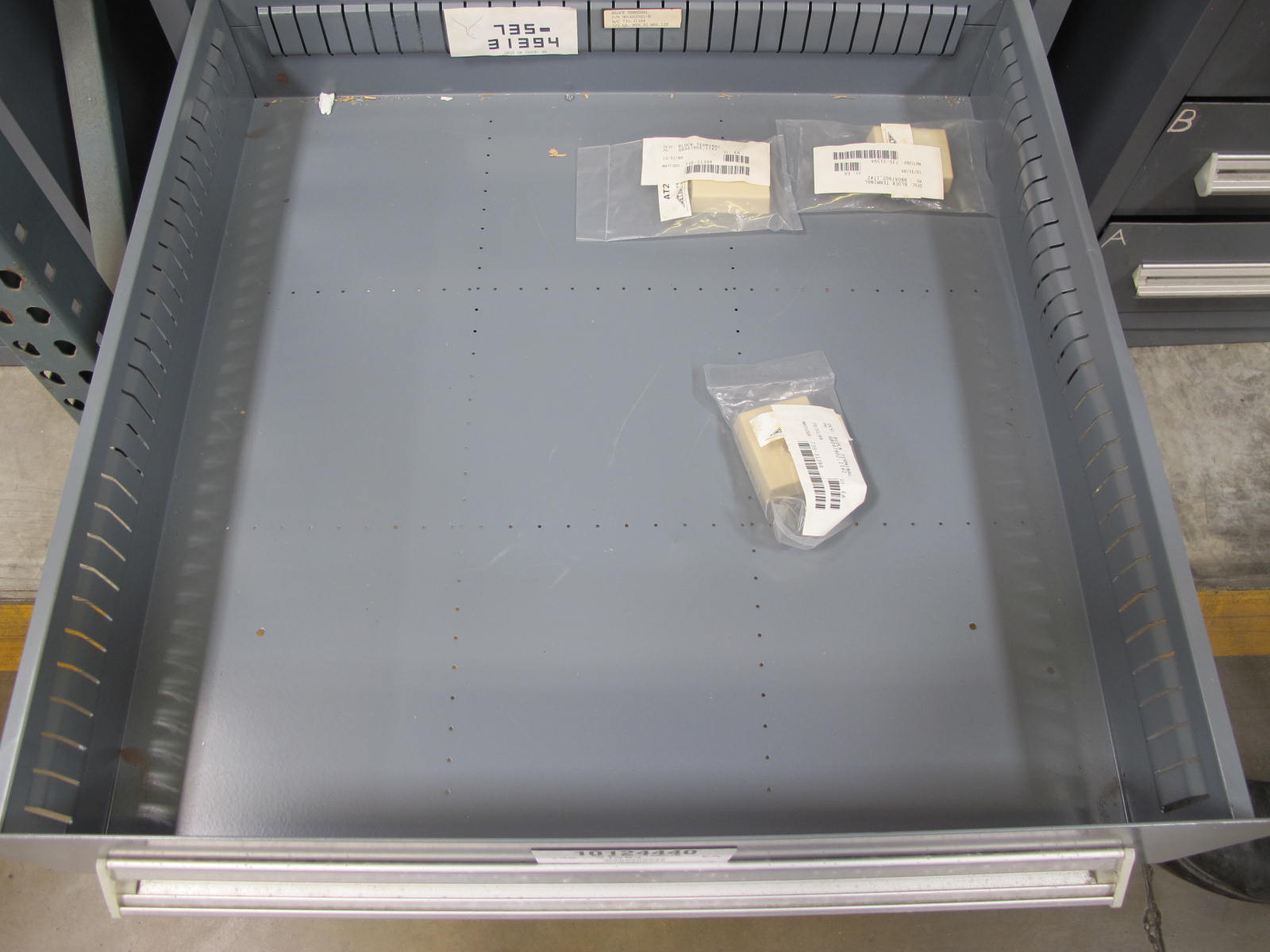 STANLEY VIDMAR CABINET, 8 DRAWER, TO INCLUDE: THERMOMETER, PHONE CORDS, RELAYS, HYGROMETERS, TERMINAL WIRES, FILTERS, MISC BRASS PARTS, SCREW KIT FOR ROSEMOUNT TRANSMITTERS. LOCATED AT W-50 . LOADING AND HANDLING FEE $25-384