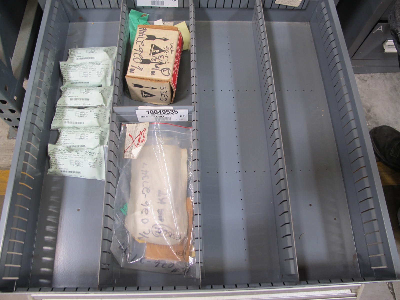 STANLEY VIDMAR CABINET, 8 DRAWER, TO INCLUDE: THERMOMETER, PHONE CORDS, RELAYS, HYGROMETERS, TERMINAL WIRES, FILTERS, MISC BRASS PARTS, SCREW KIT FOR ROSEMOUNT TRANSMITTERS. LOCATED AT W-50 . LOADING AND HANDLING FEE $25-384