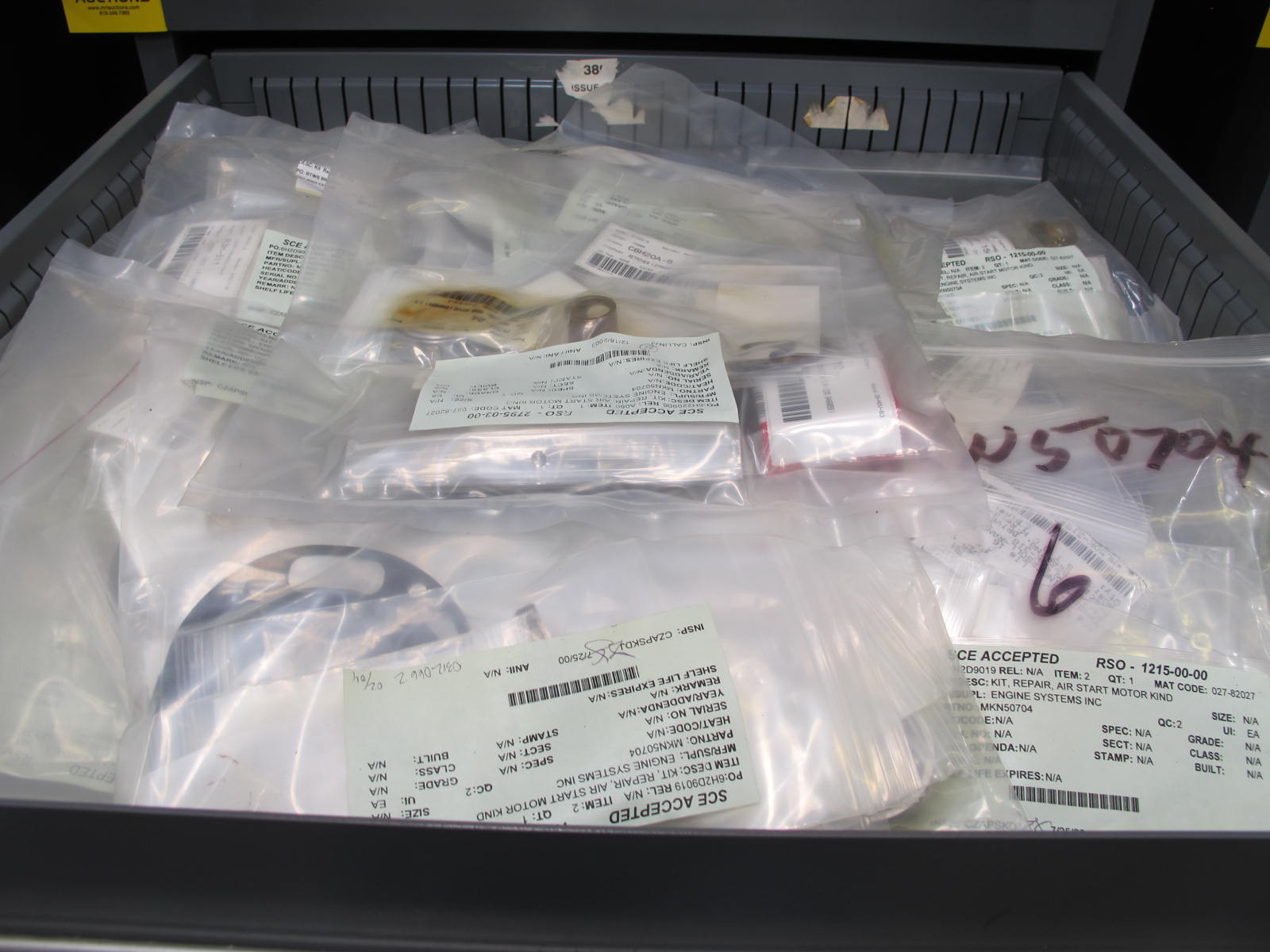 STANLEY VIDMAR CABINET, 8 DRAWER, TO INCLUDE: TERMINAL BLOCK/OUTLETS, BRAKE LINING, MOTOR REPAIR KITS, TEMPERATURE METERS, CONTROLLERS, HEADSETS, MANOMETER SLIDES. LOCATED AT W-50 . LOADING AND HANDLING FEE $25-385