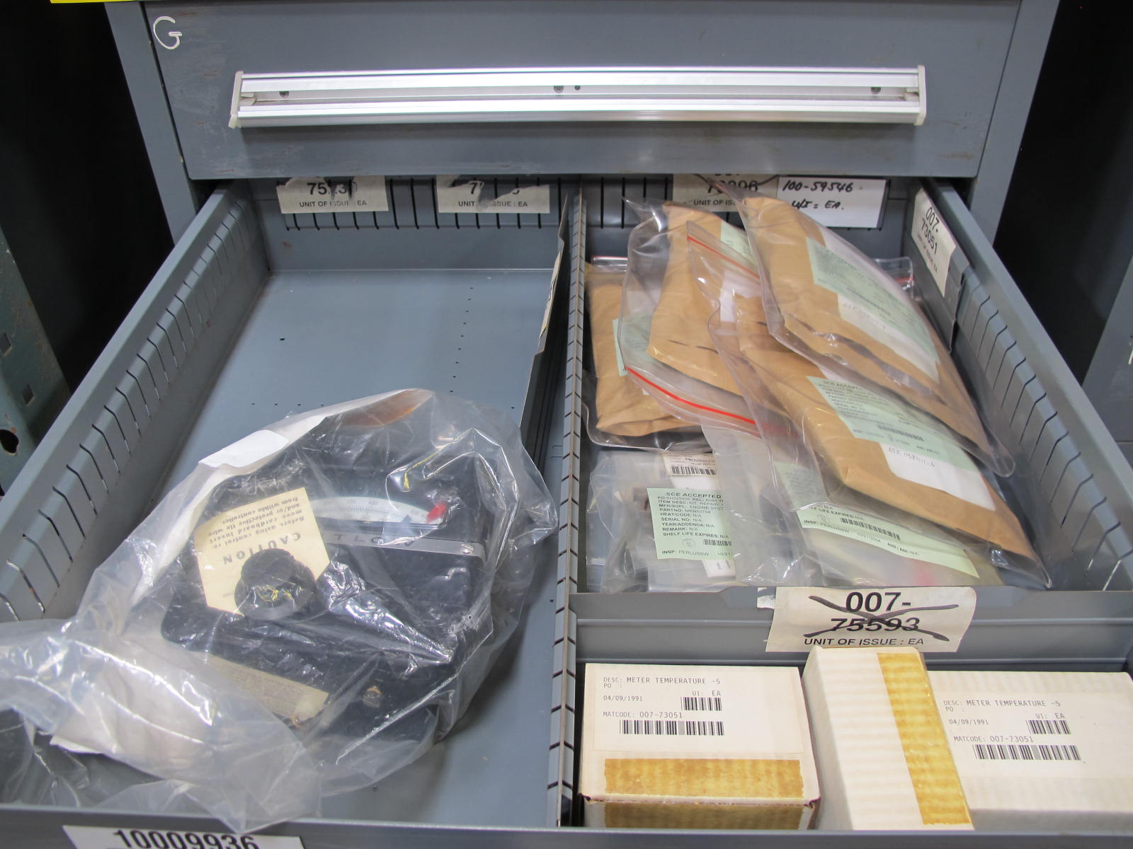STANLEY VIDMAR CABINET, 8 DRAWER, TO INCLUDE: TERMINAL BLOCK/OUTLETS, BRAKE LINING, MOTOR REPAIR KITS, TEMPERATURE METERS, CONTROLLERS, HEADSETS, MANOMETER SLIDES. LOCATED AT W-50 . LOADING AND HANDLING FEE $25-385