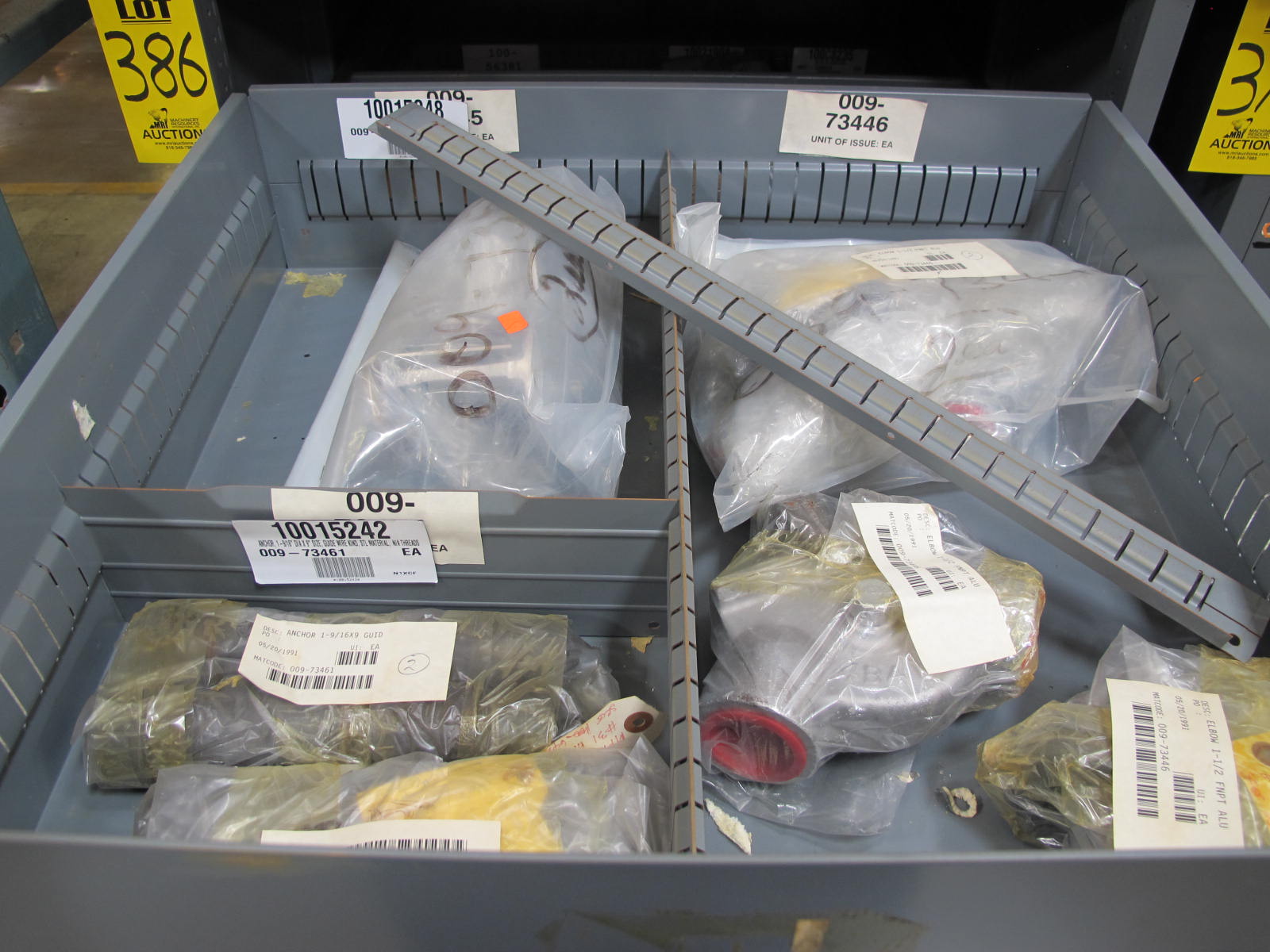 STANLEY VIDMAR CABINET, 5 DRAWER, TO INCLUDE: ELBOWS, ANCHORS, PINION GEARS, ARC CHUTES, ELECTRONIC BALANCES, STRAINERS. LOCATED AT W-50 . LOADING AND HANDLING FEE $25-386