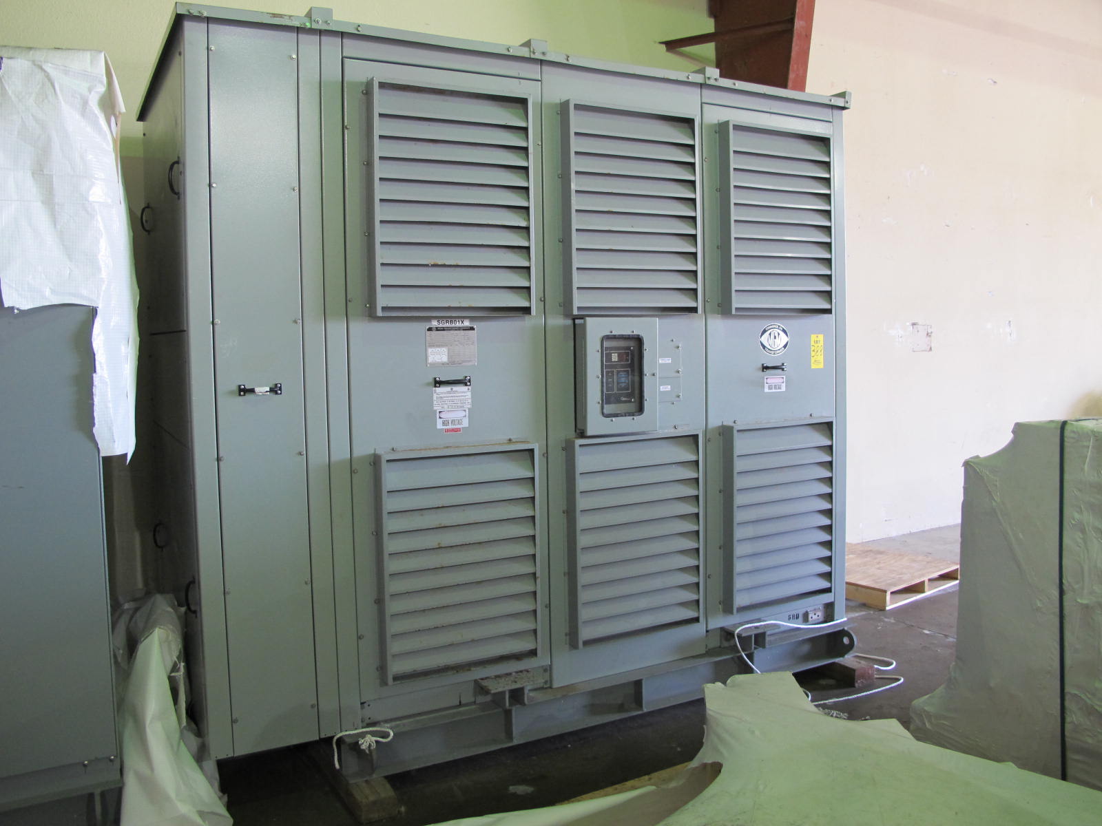 MGM DRY TYPE TRANSFORMER, 2000/2667 KVA, 3 PHASE, 60 HZ, TYPE-HT, CLASS AA/FA/, 4160 HV, 480 Y/277 LV, CAT # AD374-Y0174, S/N 08-10-00-11830A. LOCATED AT W-50 . LOADING AND HANDLING FEE $200-388
