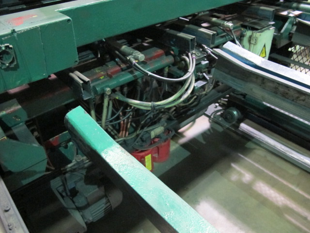 1999 CLIFFORD AUTOMATIC CNC MESH WELDING LINE, MODEL CLW12, 8MM-3MM LINE WIRE DIAMETER, 20 WIRE LINES, CROSSWIRE DIAMETER: 6MM, CROSSWIRE LENGTH: 1300 MM, LINEWIRE PITCH: INFINITELY VARIABLE FROM 10MM, CROSSWIRE FEED: SINGLE GAP TYPE MAGAZINE TOOLED FOR PRODUCING 2 MATS, SIDE BY SIDE, (10) WELDPRESSES, (20) BOTTOM ELECTRODES, (4) 125 KVA WELDING TRANSFORMERS, 120 CROSSWIRES MAX. SPEED, LINEAR MODEL QM12/25 PAILOUT, AUTOMATIC SHEET STACKER, WATER COOLING SYSTEM, MITSUISHI A1 CNC CONTROL, S/N 8874, SHEET STACKER, S/N 8979, (2) ENCLOSED CARTS FULL OF WELDING TIPS AND REALTED TOOLING INCLUDED WITH MACHINE-2