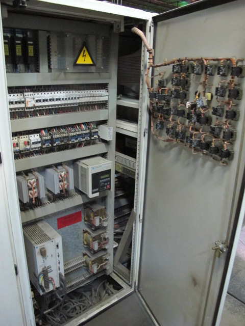 1999 CLIFFORD AUTOMATIC CNC MESH WELDING LINE, MODEL CLW12, 8MM-3MM LINE WIRE DIAMETER, 20 WIRE LINES, CROSSWIRE DIAMETER: 6MM, CROSSWIRE LENGTH: 1300 MM, LINEWIRE PITCH: INFINITELY VARIABLE FROM 10MM, CROSSWIRE FEED: SINGLE GAP TYPE MAGAZINE TOOLED FOR PRODUCING 2 MATS, SIDE BY SIDE, (10) WELDPRESSES, (20) BOTTOM ELECTRODES, (4) 125 KVA WELDING TRANSFORMERS, 120 CROSSWIRES MAX. SPEED, LINEAR MODEL QM12/25 PAILOUT, AUTOMATIC SHEET STACKER, WATER COOLING SYSTEM, MITSUISHI A1 CNC CONTROL, S/N 8874, SHEET STACKER, S/N 8979, (2) ENCLOSED CARTS FULL OF WELDING TIPS AND REALTED TOOLING INCLUDED WITH MACHINE-2