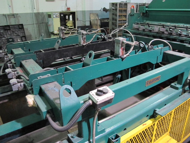 1999 CLIFFORD AUTOMATIC CNC MESH WELDING LINE, MODEL CLW12, 8MM-3MM LINE WIRE DIAMETER, 20 WIRE LINES, CROSSWIRE DIAMETER: 6MM, CROSSWIRE LENGTH: 1300 MM, LINEWIRE PITCH: INFINITELY VARIABLE FROM 10MM, CROSSWIRE FEED: SINGLE GAP TYPE MAGAZINE TOOLED FOR PRODUCING 2 MATS, SIDE BY SIDE, (10) WELDPRESSES, (20) BOTTOM ELECTRODES, (4) 125 KVA WELDING TRANSFORMERS, 120 CROSSWIRES MAX. SPEED, LINEAR MODEL QM12/25 PAILOUT, AUTOMATIC SHEET STACKER, WATER COOLING SYSTEM, MITSUISHI A1 CNC CONTROL, S/N 8874, SHEET STACKER, S/N 8979, (2) ENCLOSED CARTS FULL OF WELDING TIPS AND REALTED TOOLING INCLUDED WITH MACHINE-2