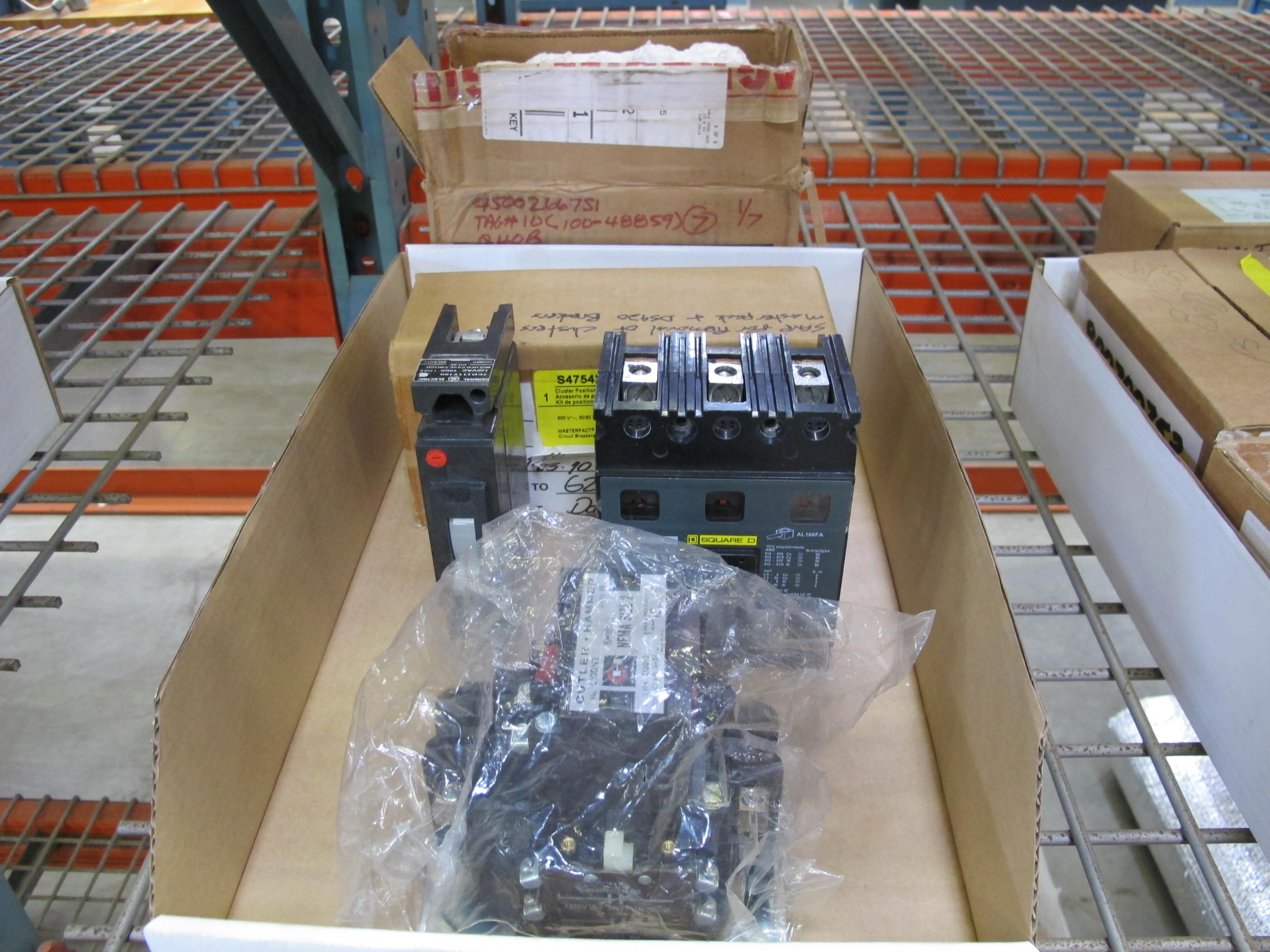 MISC. SQUARE-D AND CUTLER HAMMER MOTOR CIRCUIT PROTECTORS WITH ROLLS OF REFLECTIVE TARP. LOADING & HANDLING $5-1471