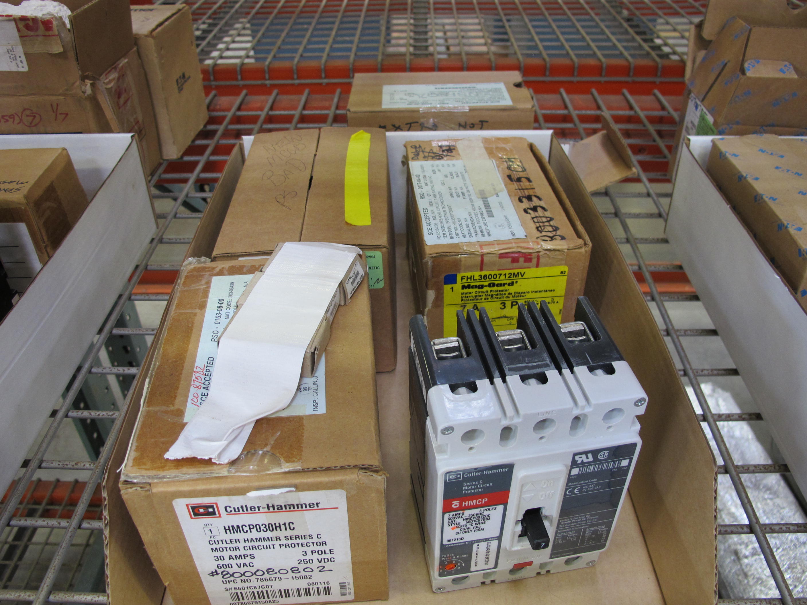 MISC. SQUARE-D AND CUTLER HAMMER MOTOR CIRCUIT PROTECTORS WITH ROLLS OF REFLECTIVE TARP. LOADING & HANDLING $5-1471