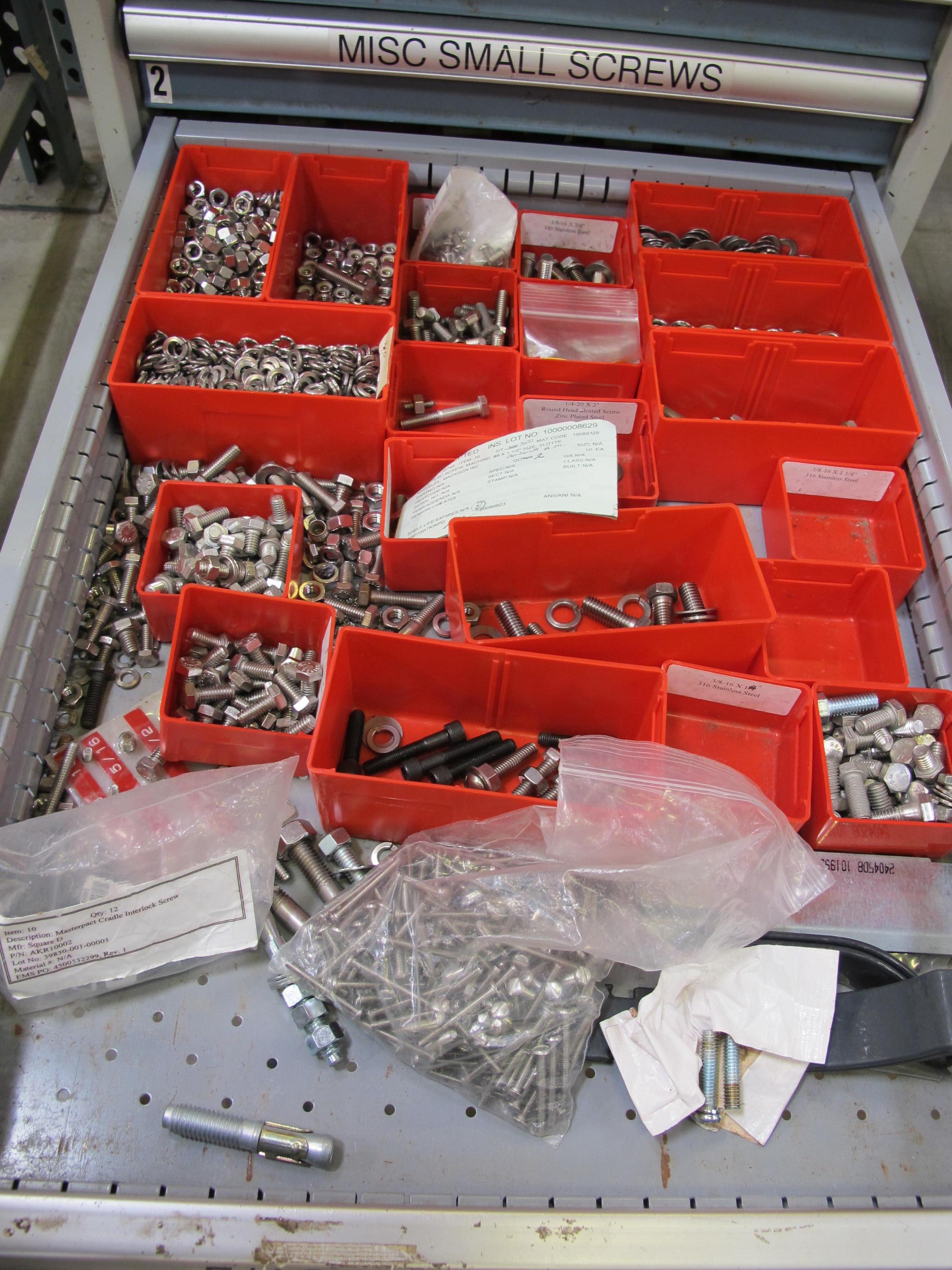 LOT TO INCLUDE: BUTCHER BLOCK TABLE TOP 72"L X 30"W, (2) LISTA 7 DRAWER CABINET WITH MISC. BOLTS, NUTS, SCREWS, AND FITTINGS. LOADING & HANDLING $15-1712