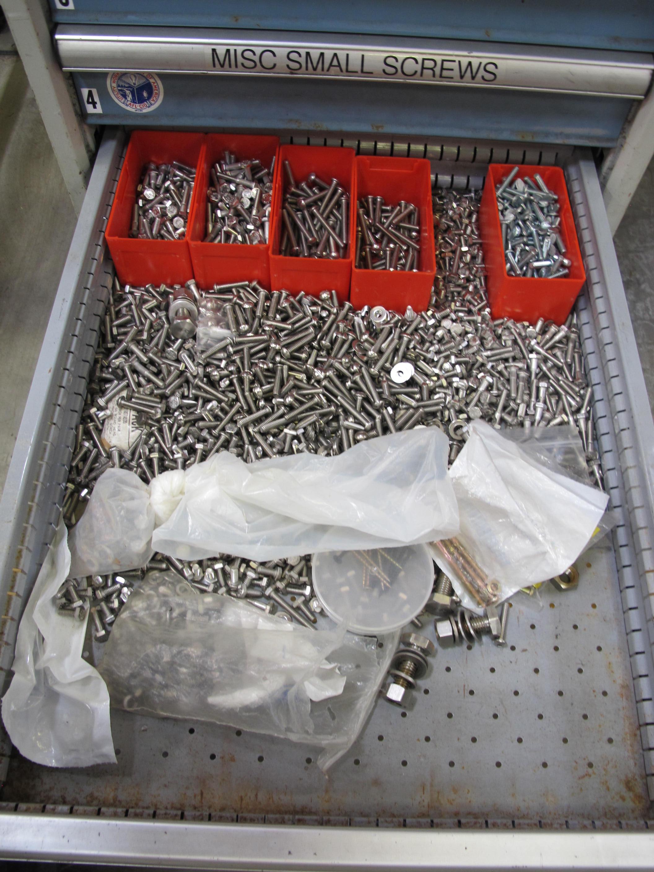 LOT TO INCLUDE: BUTCHER BLOCK TABLE TOP 72"L X 30"W, (2) LISTA 7 DRAWER CABINET WITH MISC. BOLTS, NUTS, SCREWS, AND FITTINGS. LOADING & HANDLING $15-1712