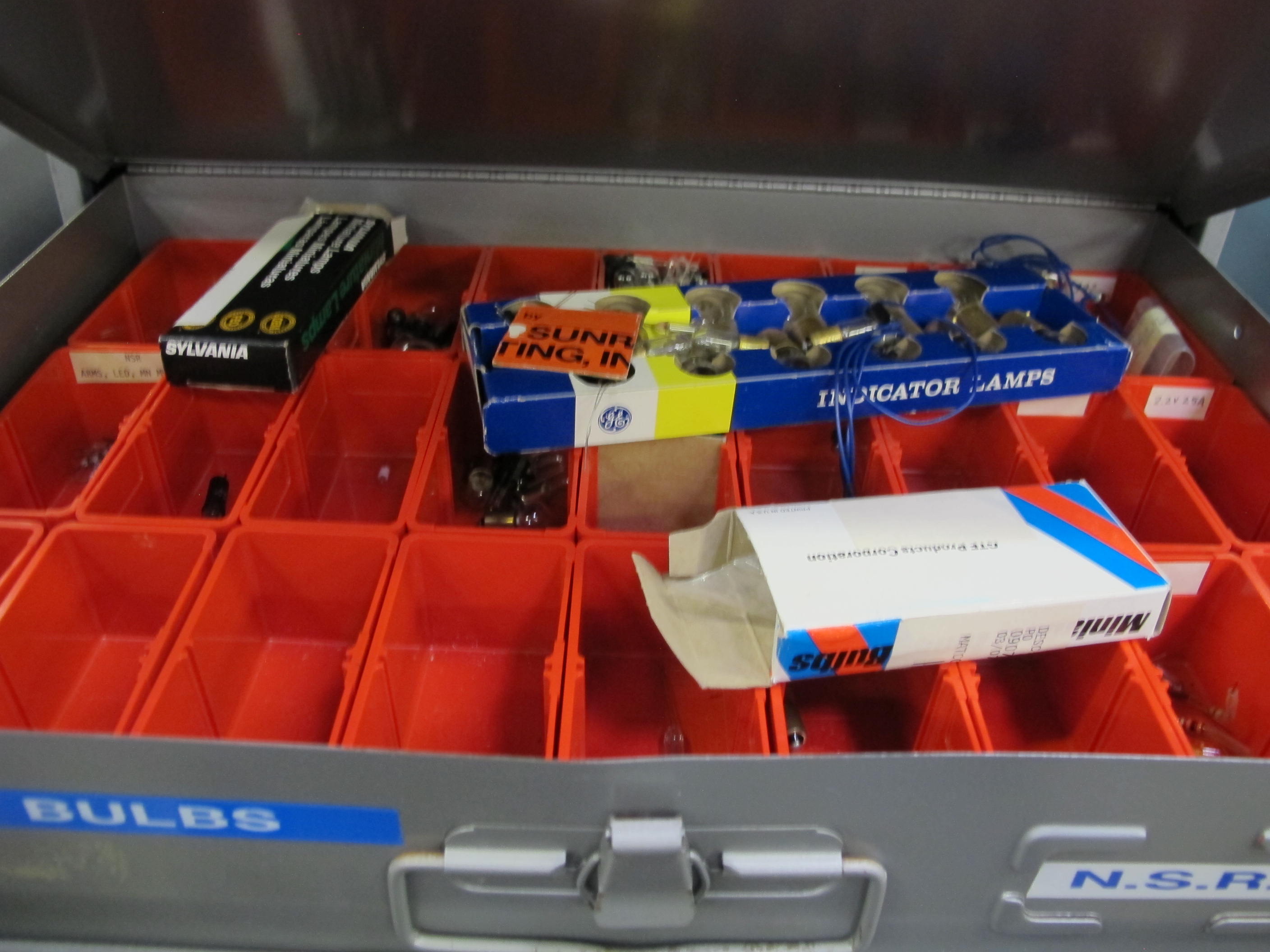 (2) 4 DRAWER PARTS CABINETS WITH CARRY DRAWERS TO INCLUDE CONTENTS: DIODES, RESISTORS, CAPACITORS, LIGHT BULBS, FUSES, TRANSISTORS, CIRCUITS. LOADING & HANDLING $15-1751