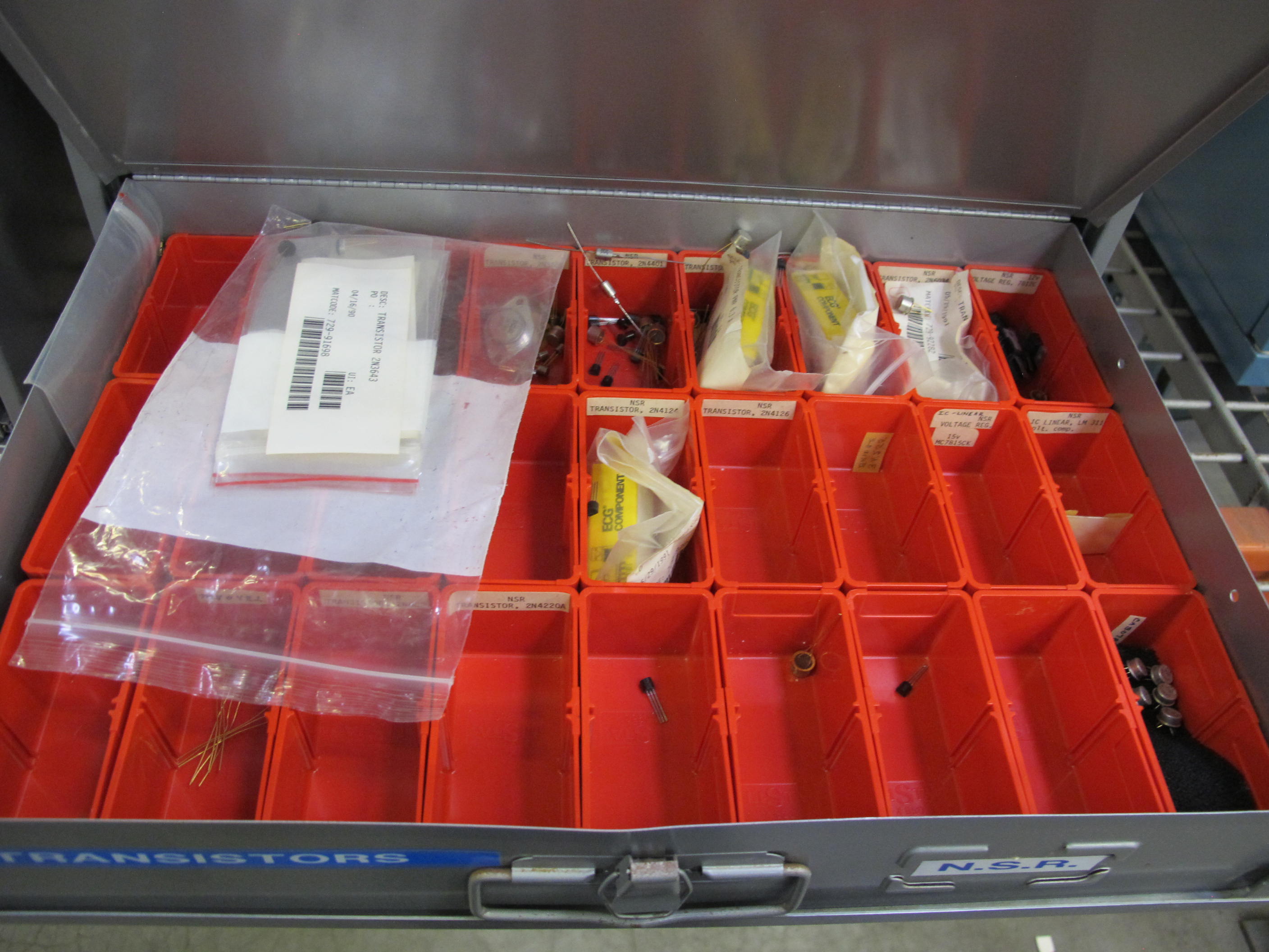 (2) 4 DRAWER PARTS CABINETS WITH CARRY DRAWERS TO INCLUDE CONTENTS: DIODES, RESISTORS, CAPACITORS, LIGHT BULBS, FUSES, TRANSISTORS, CIRCUITS. LOADING & HANDLING $15-1751